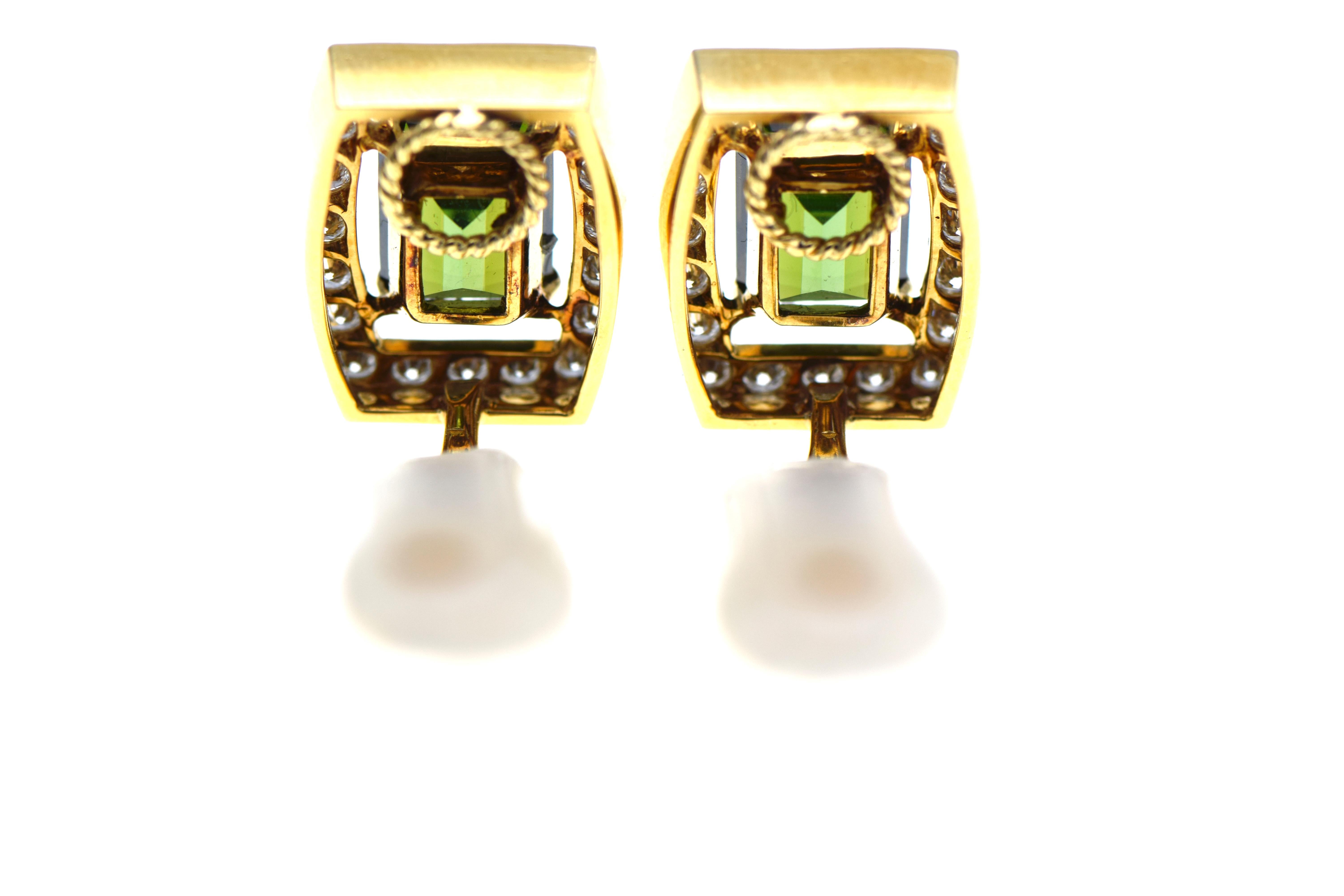 Pair of 18 karat Gold, Tourmaline and Diamond Earclips, David Webb featuring 2 emerald-cut Tourmalines approximately 8.00 carats, within bowed rectangular frames of 40 Round Brilliant Cut Diamonds approximately 2.25 carats, signed 