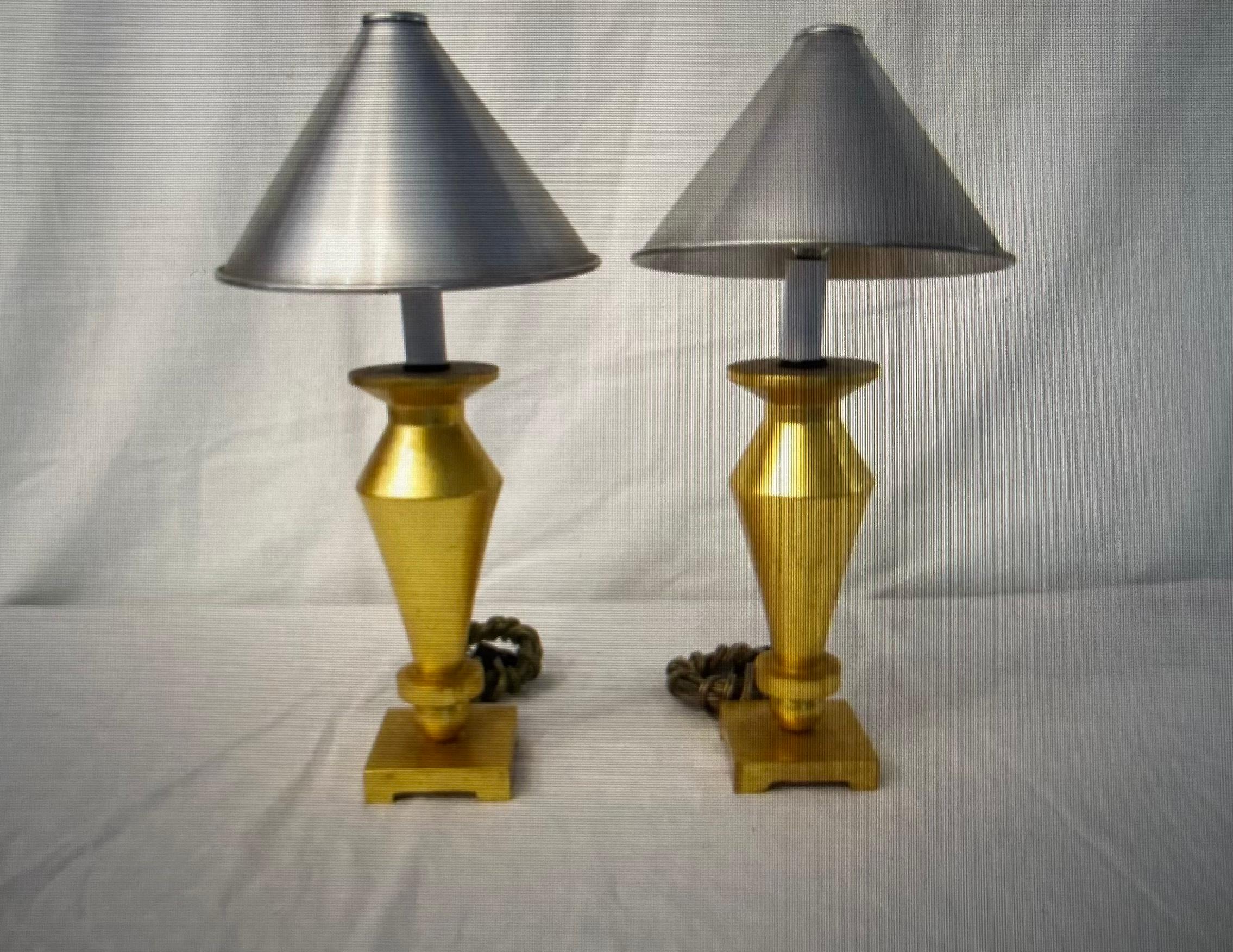 Pair of gold wood lamps with aluminum shades.