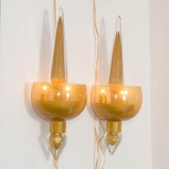 Pair of golden amber glass sconces