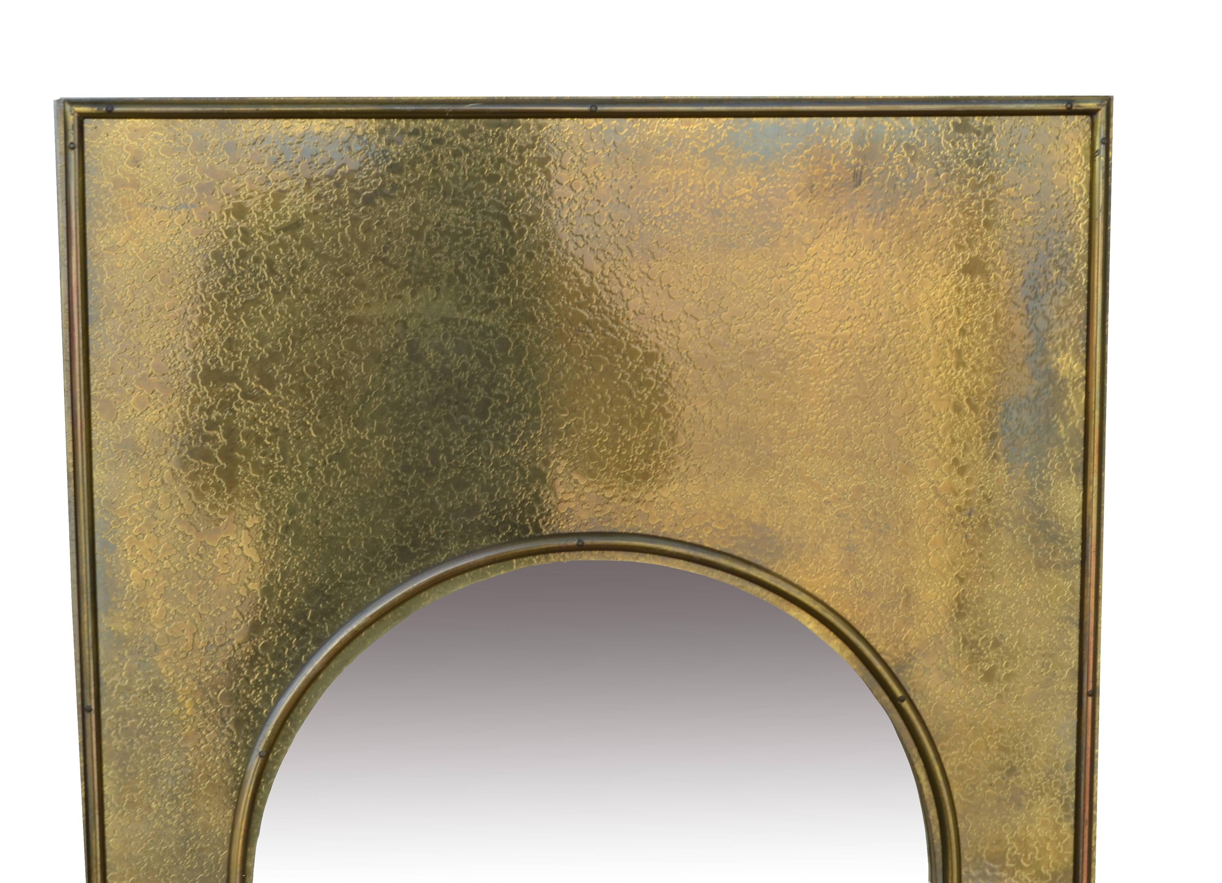 A pair of vintage etched brass arched Palladian wall mirrors by Mastercraft. 
Excellence of quality with brilliant craftsmanship.

Mirror size: 41.0 inches height x 13.0 inches wide.
 