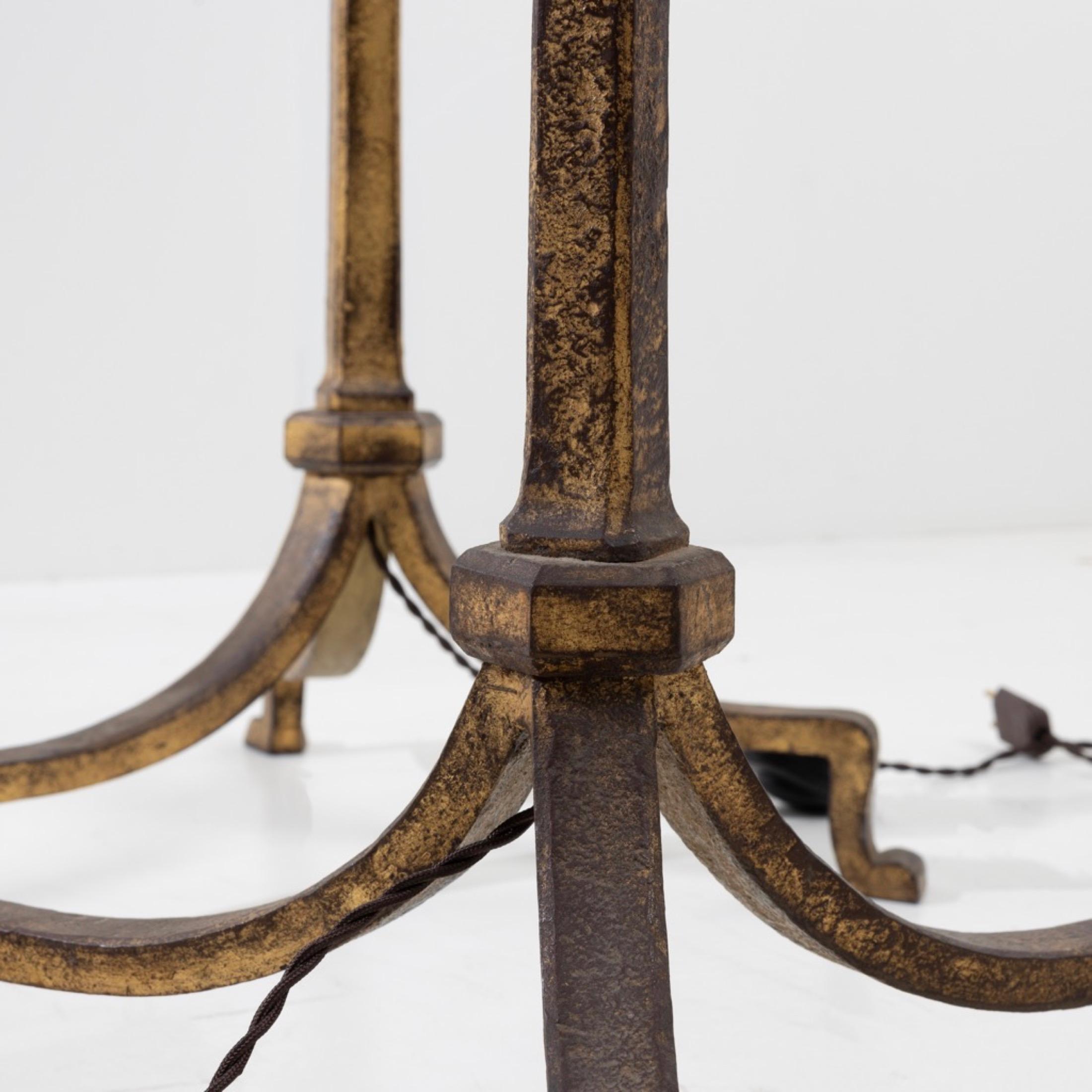 French Pair of golden iron floor Lamps by Maison Ramsay  For Sale