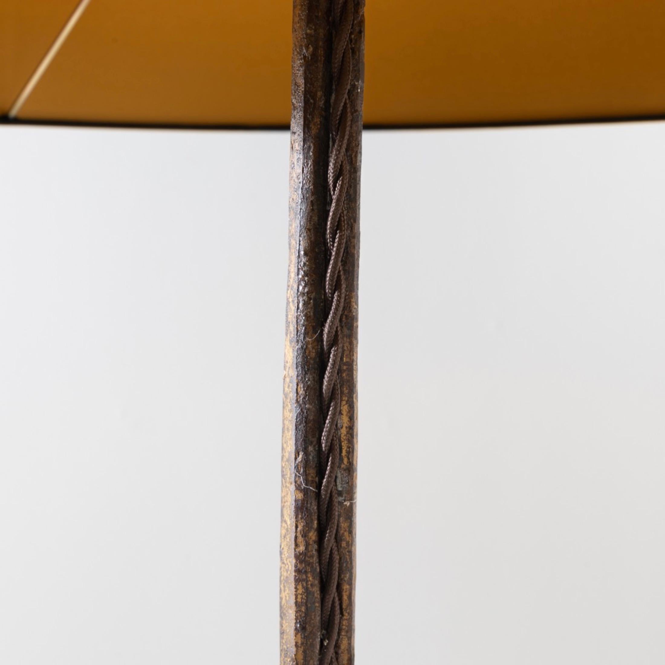 Iron Pair of golden iron floor Lamps by Maison Ramsay  For Sale