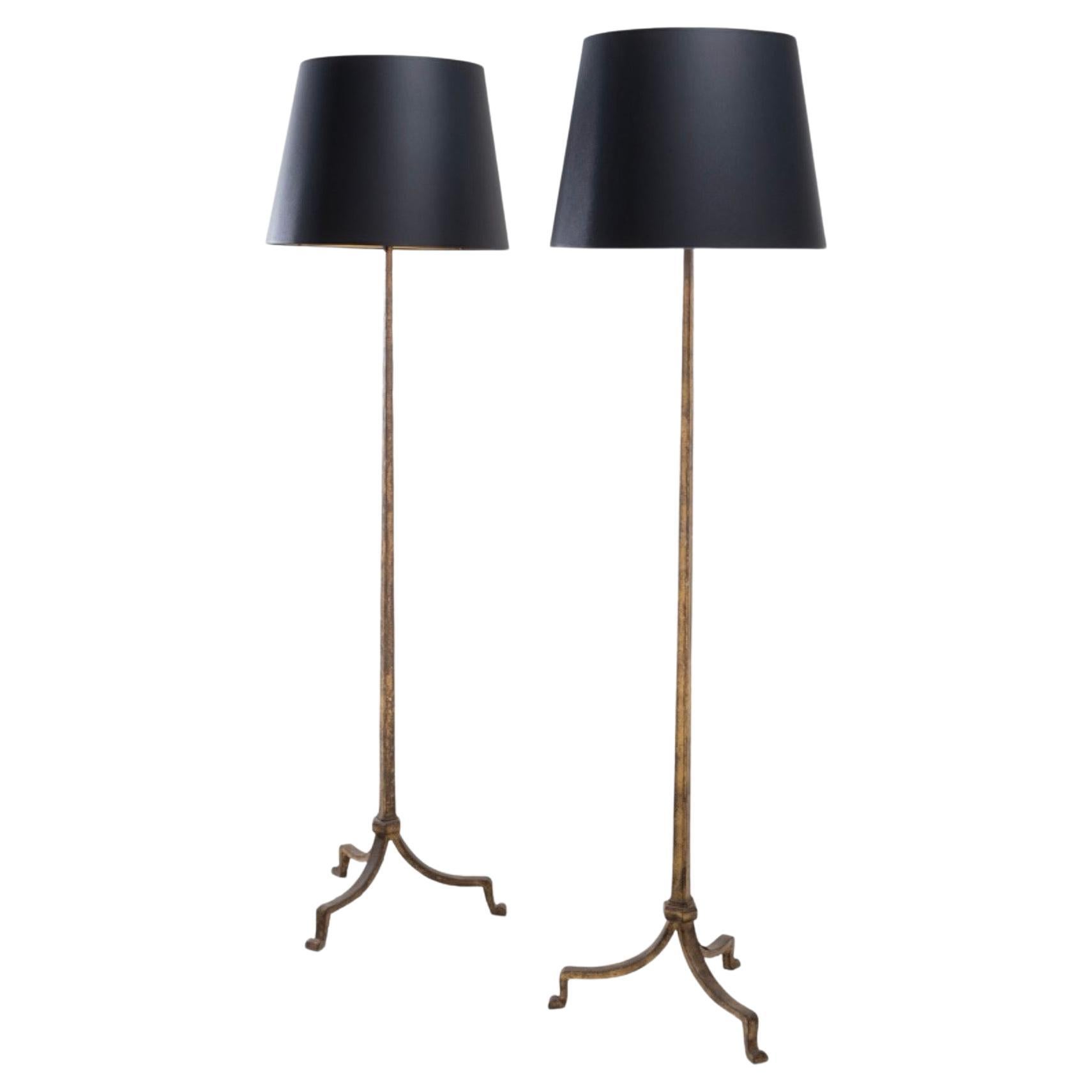 Pair of golden iron floor Lamps by Maison Ramsay  For Sale