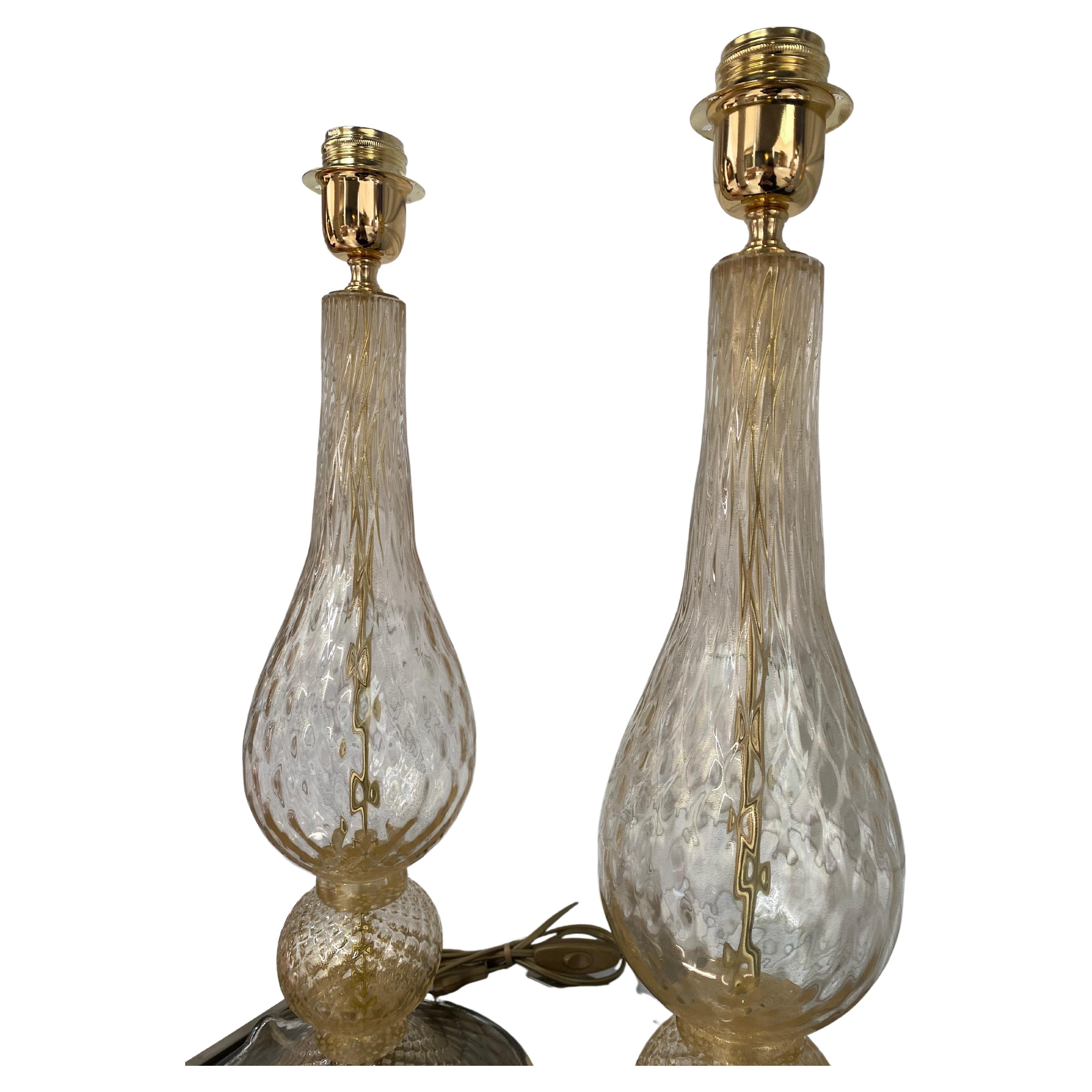 Pair of golden lamps Alberto Dona Murano (11 and 12)
Circa 1970
Signed on the foot 
Dimensions : h52x20cm

Price : 3500 € for the pair.