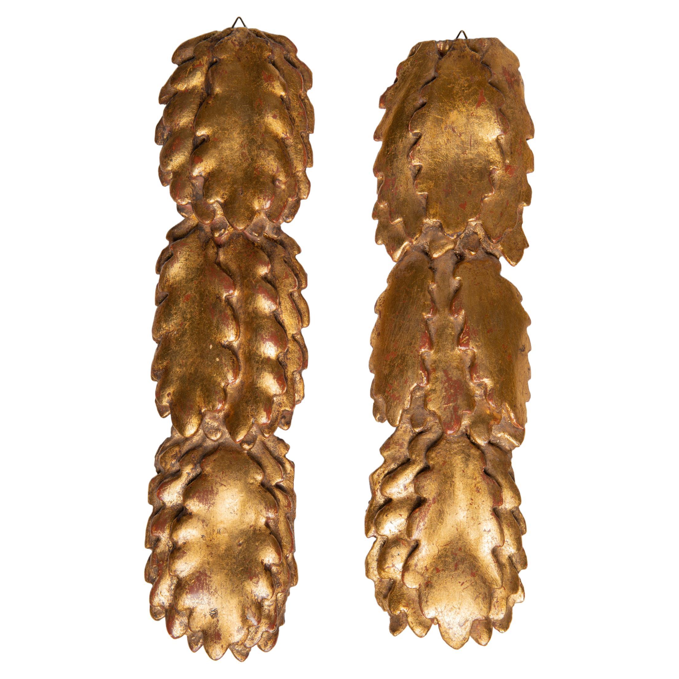 Paire de frises à feuilles dorées en vente