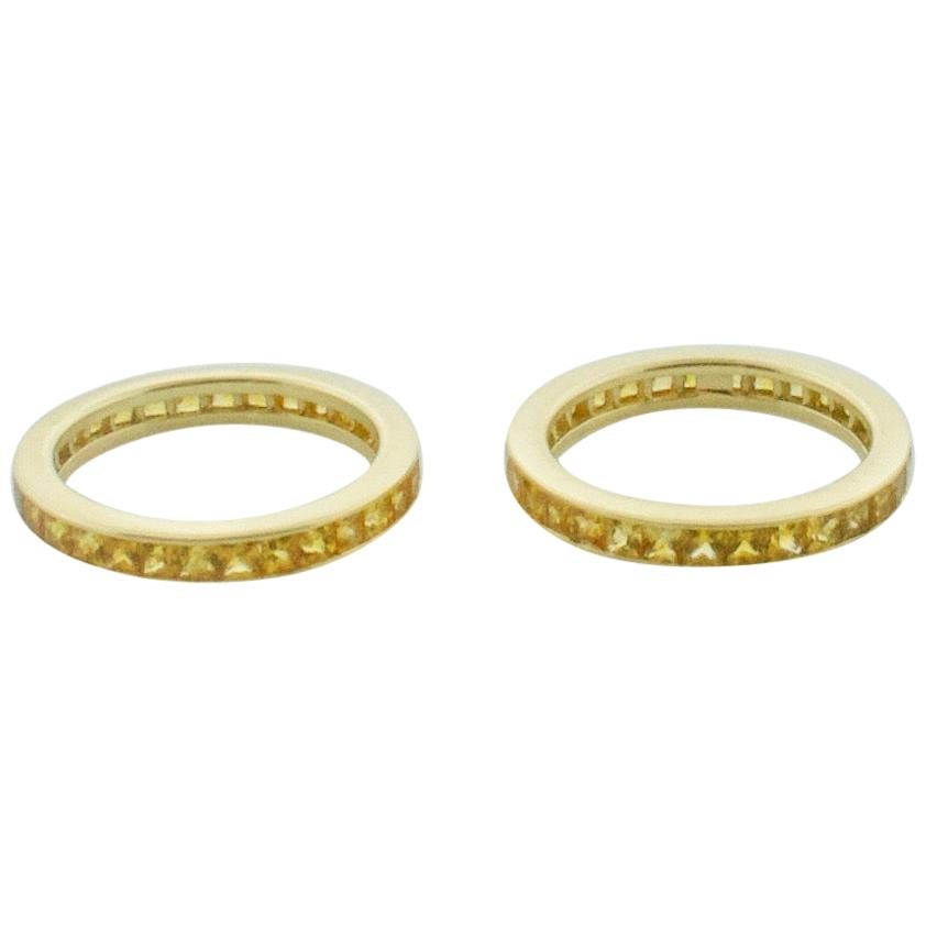 Pair of Golden Sapphire Eternity Rings in 18 Karat Yellow Gold For Sale