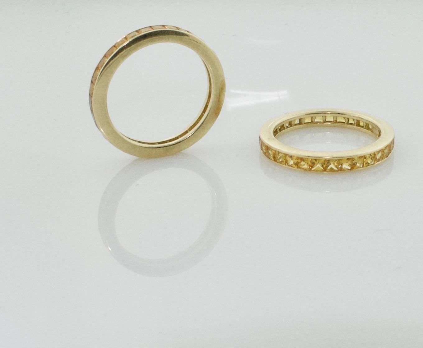 Modern Pair of Golden Sapphire Eternity Rings in 18 Karat Yellow Gold For Sale