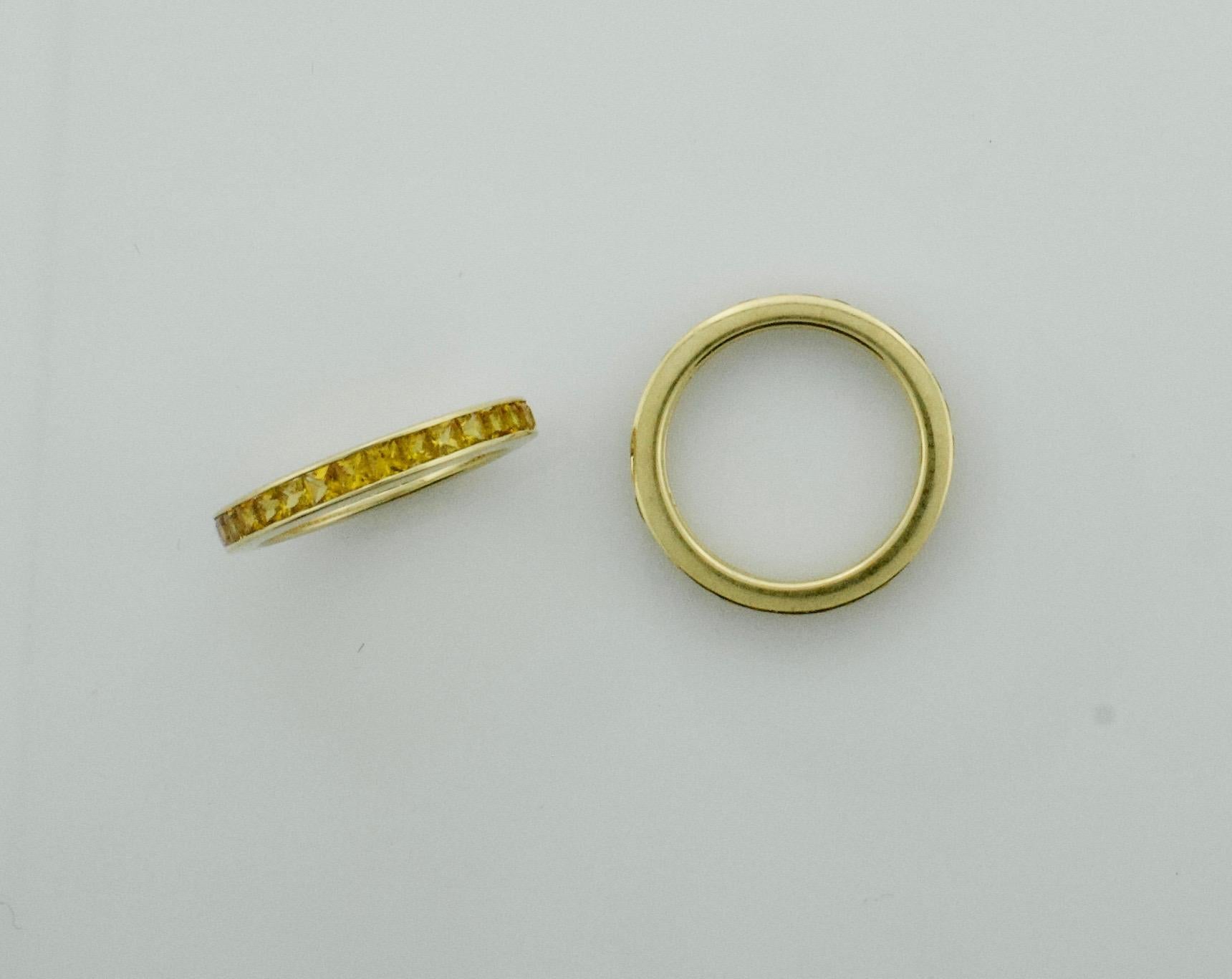 French Cut Pair of Golden Sapphire Eternity Rings in 18 Karat Yellow Gold For Sale