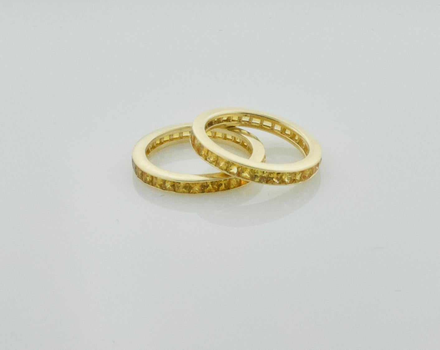 Women's or Men's Pair of Golden Sapphire Eternity Rings in 18 Karat Yellow Gold For Sale