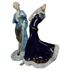 Pair of Goldschneider and Royal Dux Figures