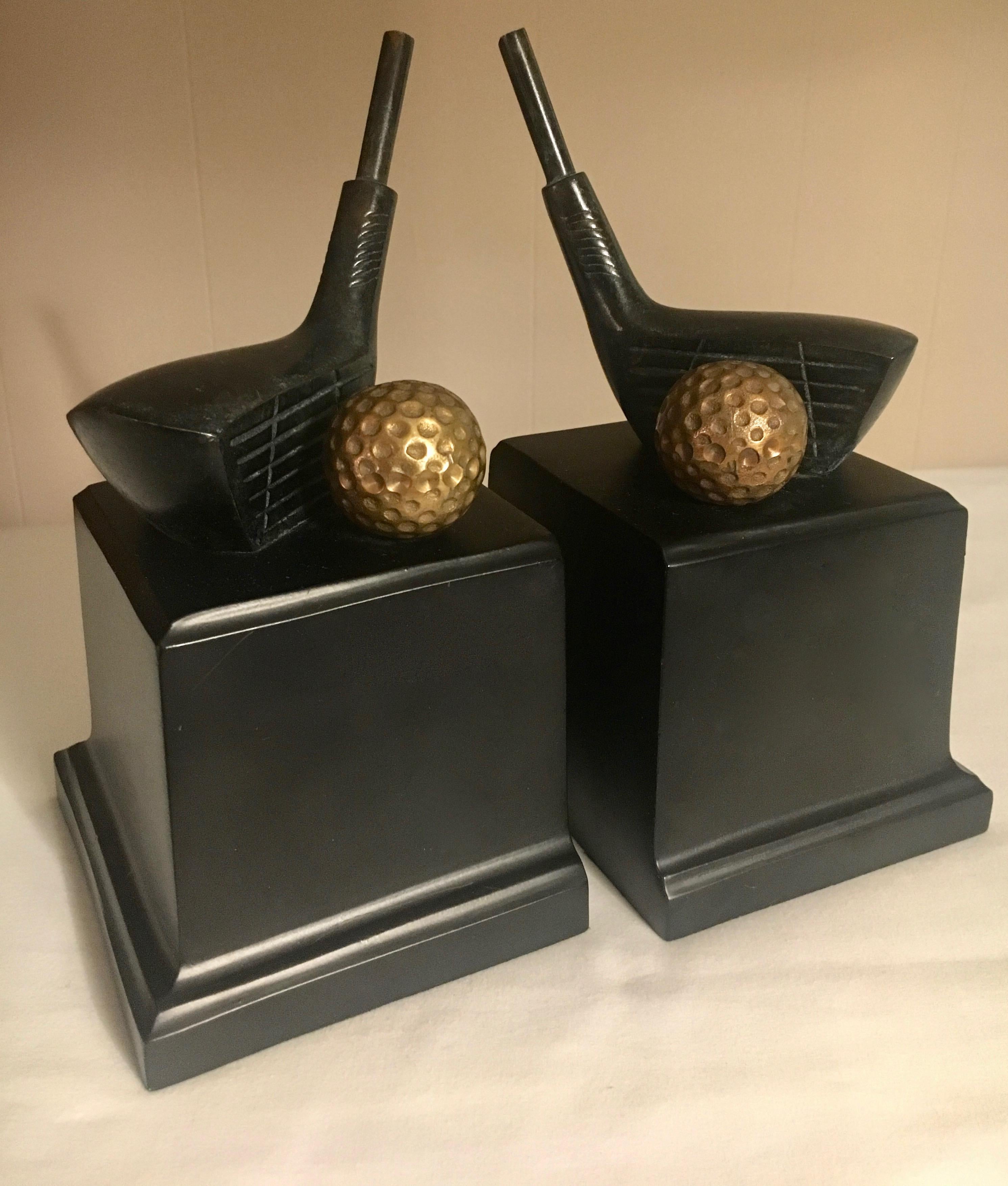 Pair of golf bookends - a handsome pair of bookends with a portion of a club with brass ball atop a wooden base. Great gift or decor for the golf aficionado.  Fathers day gifts too