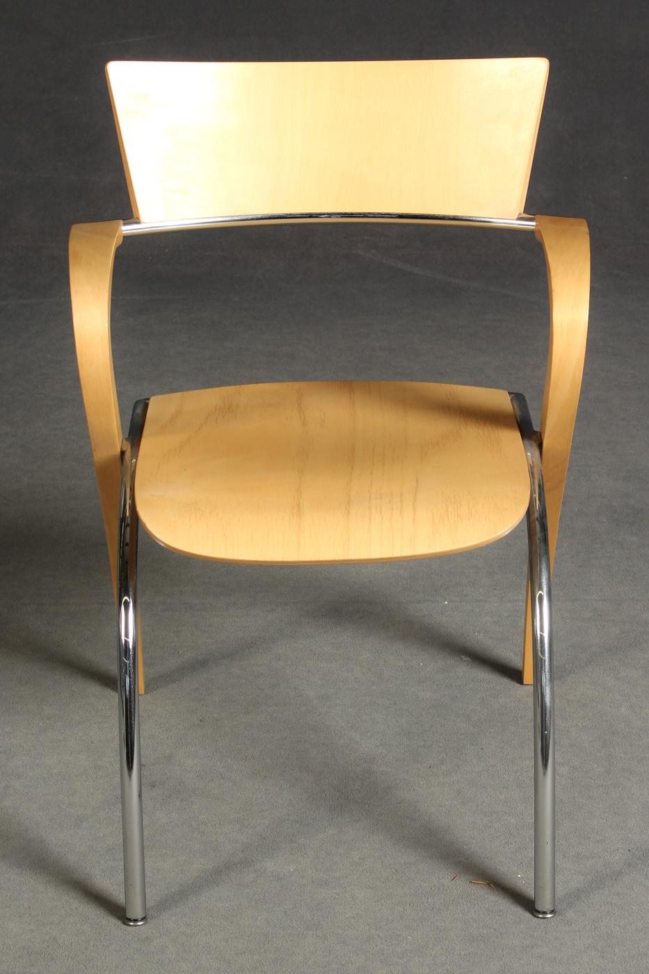 Francesco Zaccone, pair of 'golf' chairs for Brunner. Frame: steel pipe/aluminum die-cast combination. Armrest beech wood, seat and back: beech. One with seat and back polished. Plastic glides. Stackable.