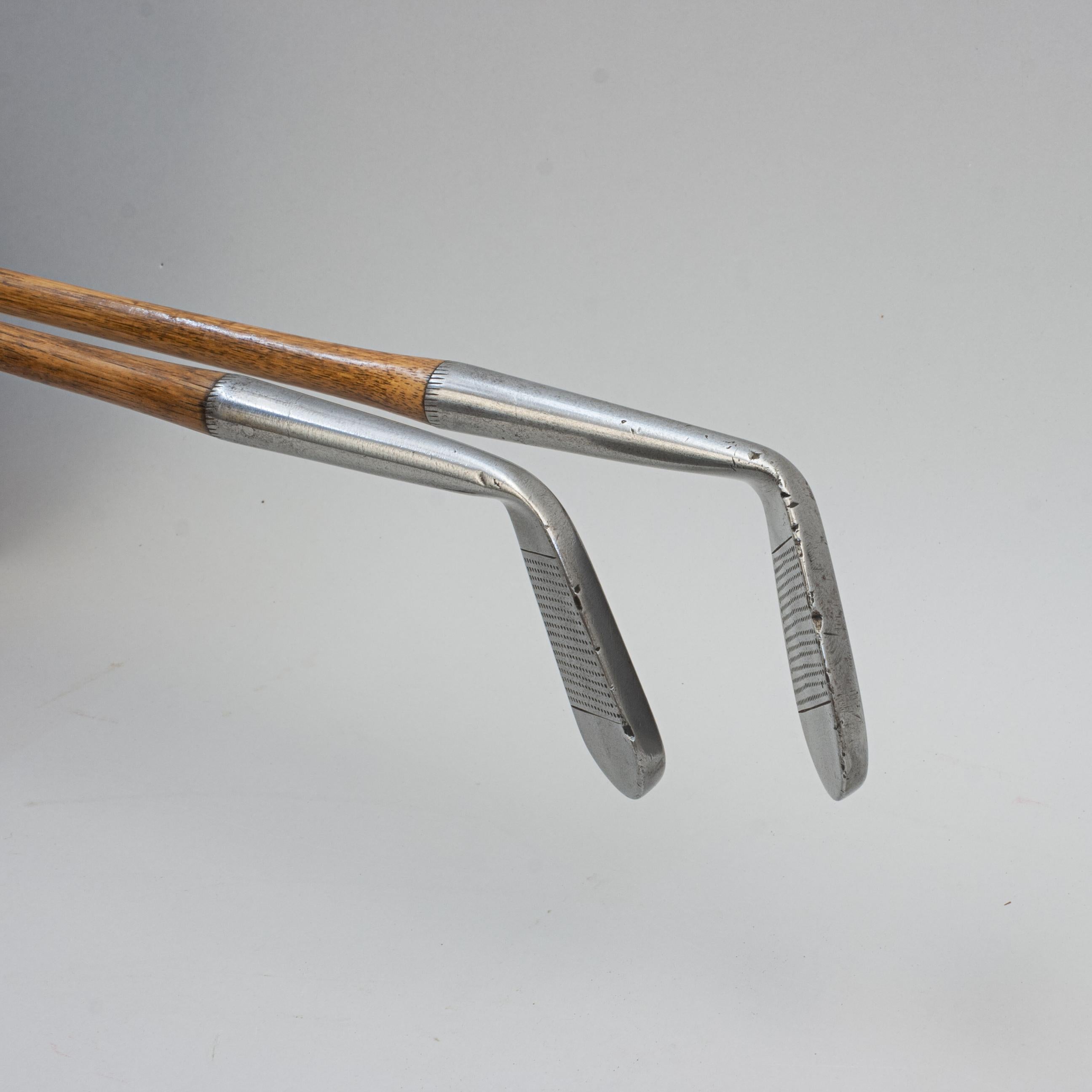 20th Century Pair of Golf Clubs by R. Forgan. Scotia, Mashie and Niblick