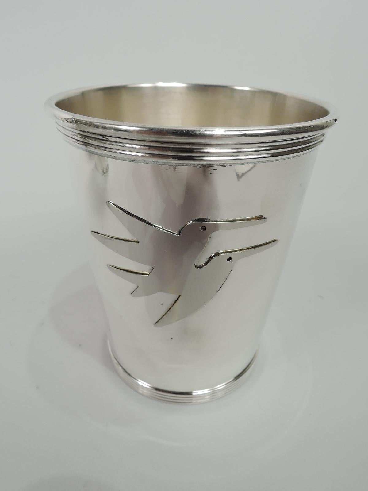 Pair of Modern sterling silver mint julep cups. Made by Gorham in Providence. Each: Straight and tapering, and reeded rim and foot. Cutout pair of semi-abstract birds applied to side. Traditional form with midcentury free spiritedness. Marked