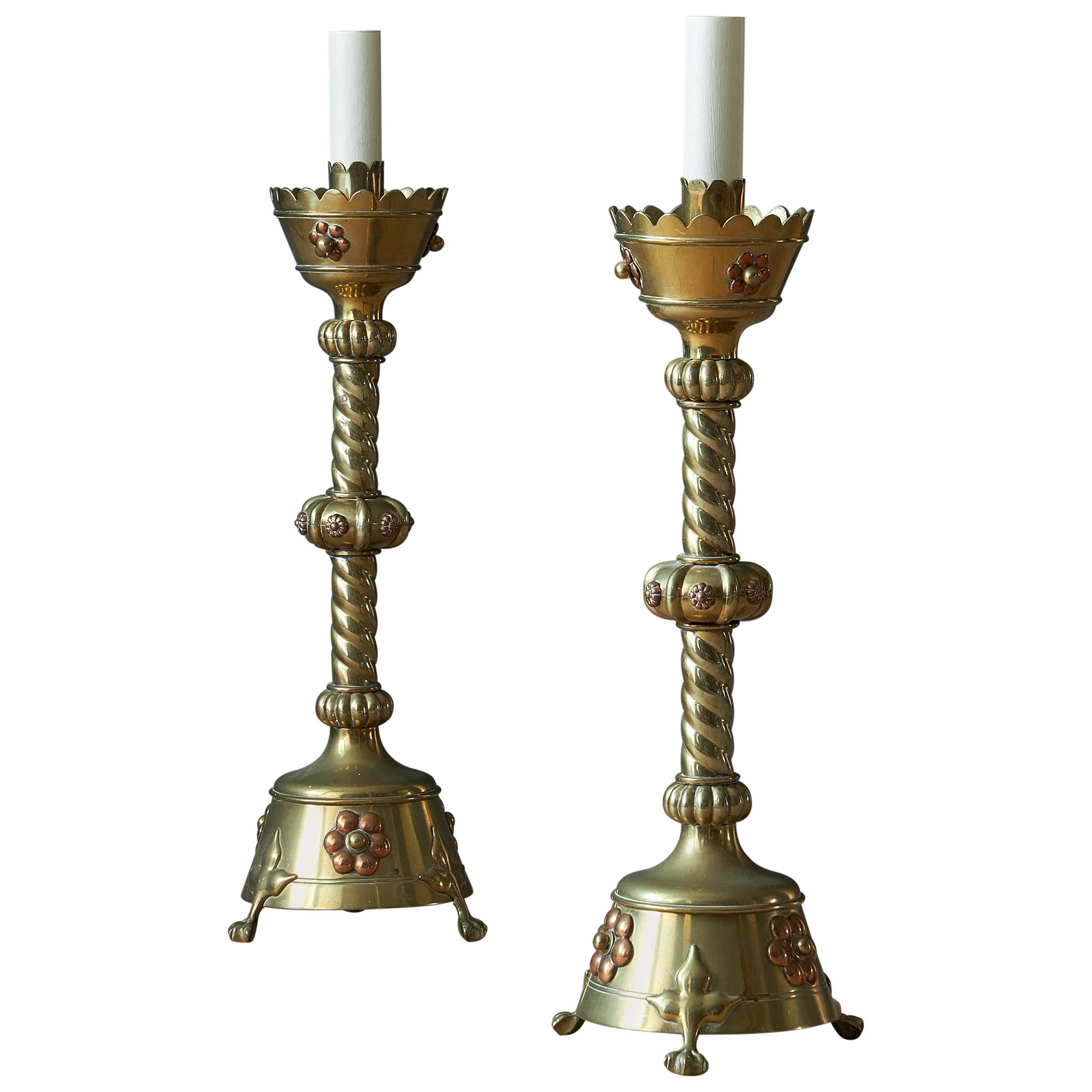 A pair of brass and copper Gothic Revival candlestick lamp bases, 19th century