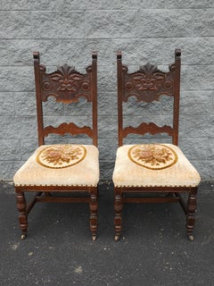 Pair Of Gothic Revival Style Stained Oak Wood And Upholstered Seat Side Chairs