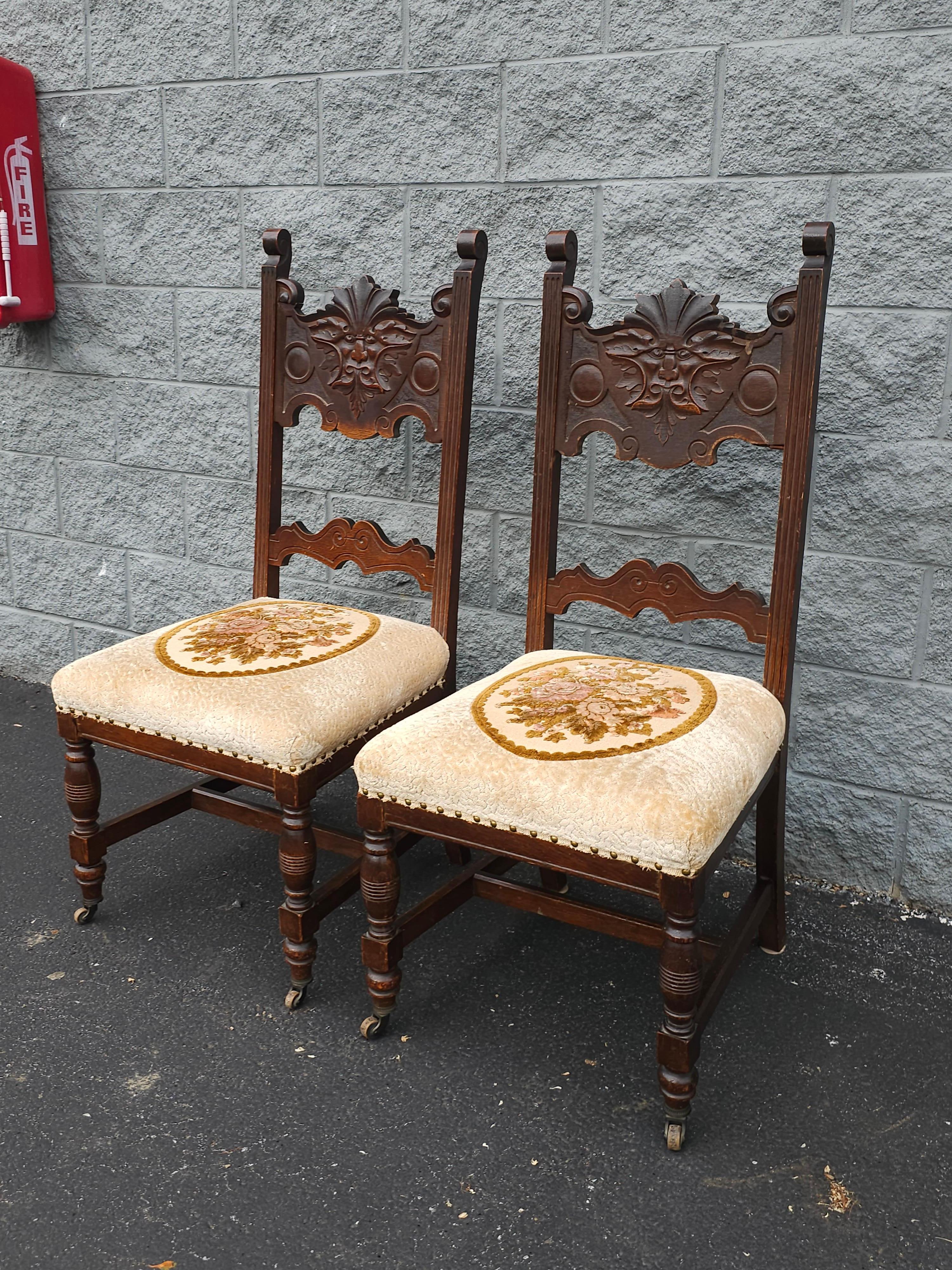 American Pair Of Gothic Revival Style Stained Oak Wood And Upholstered Seat Side Chairs For Sale