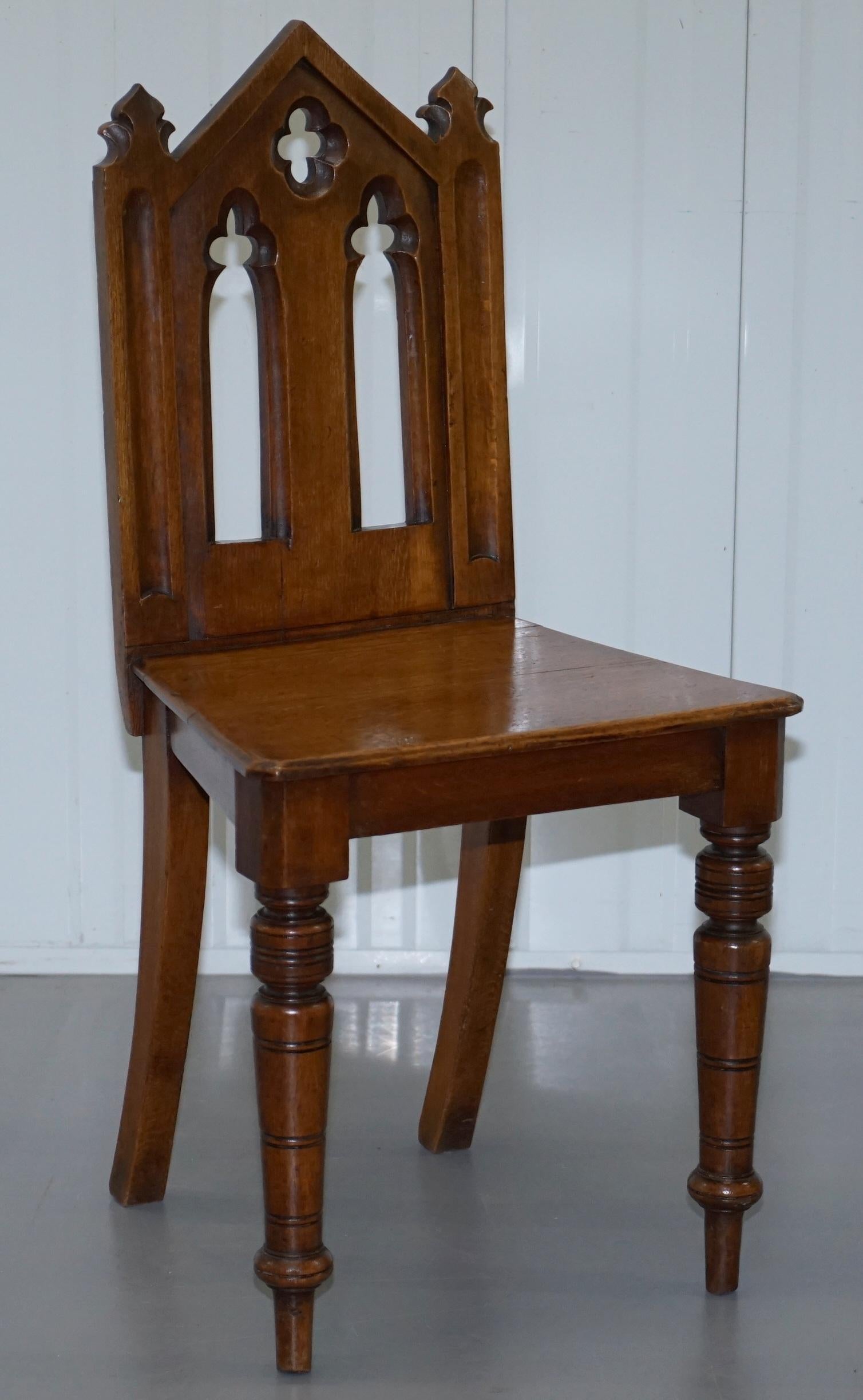 We are delighted to offer for sale this stunning pair of solid mahogany Gothic Revival hall chairs with steeple arched backs dating to circa 1880

A very good looking and decorative pair of chairs, the design is quite rare for the type, I’ve only