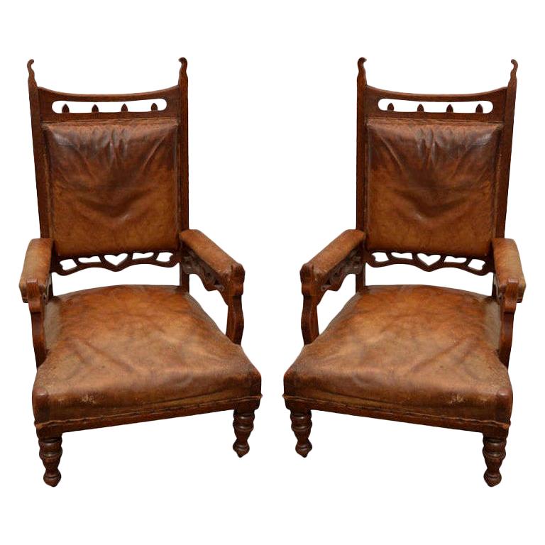 Pair of 19th Century English Gothic-Style Brown Leather and Oak Armchairs