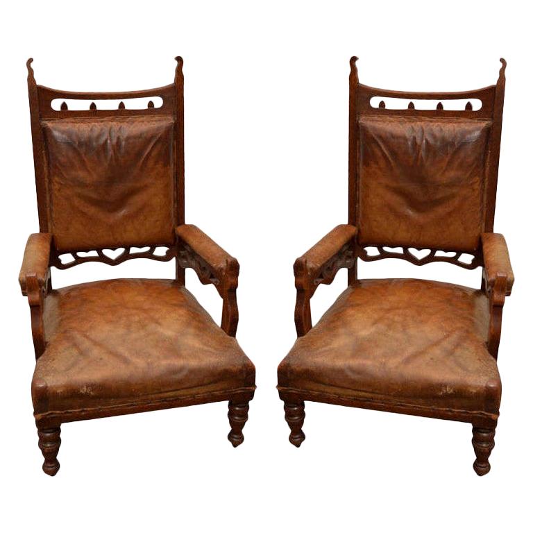 Pair of 19th Century GothicStyle Brown Leather and Oak Armchairs