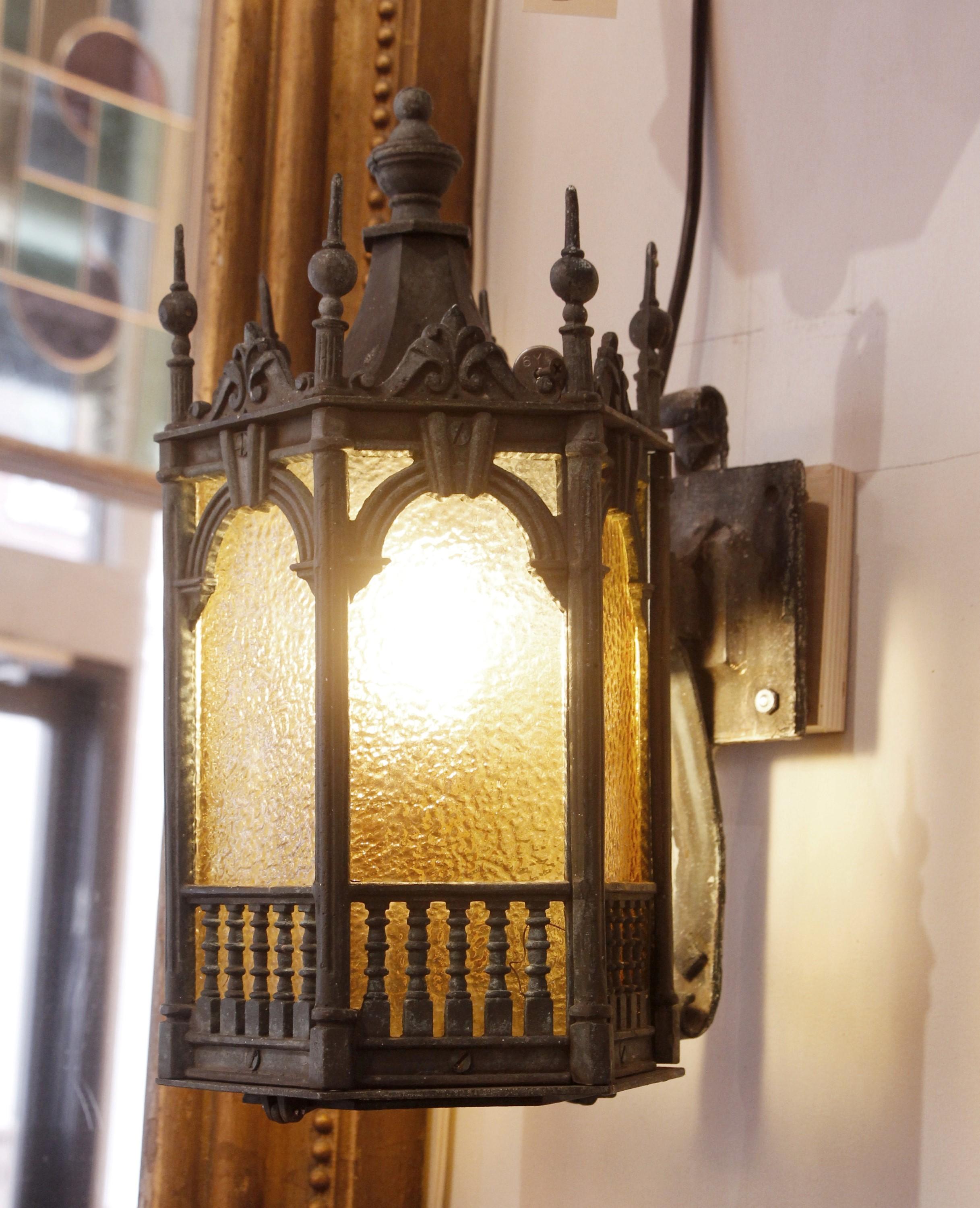 Pair Gothic Tudor Bronze Lantern Sconces Textured Amber Glass  In Good Condition In New York, NY