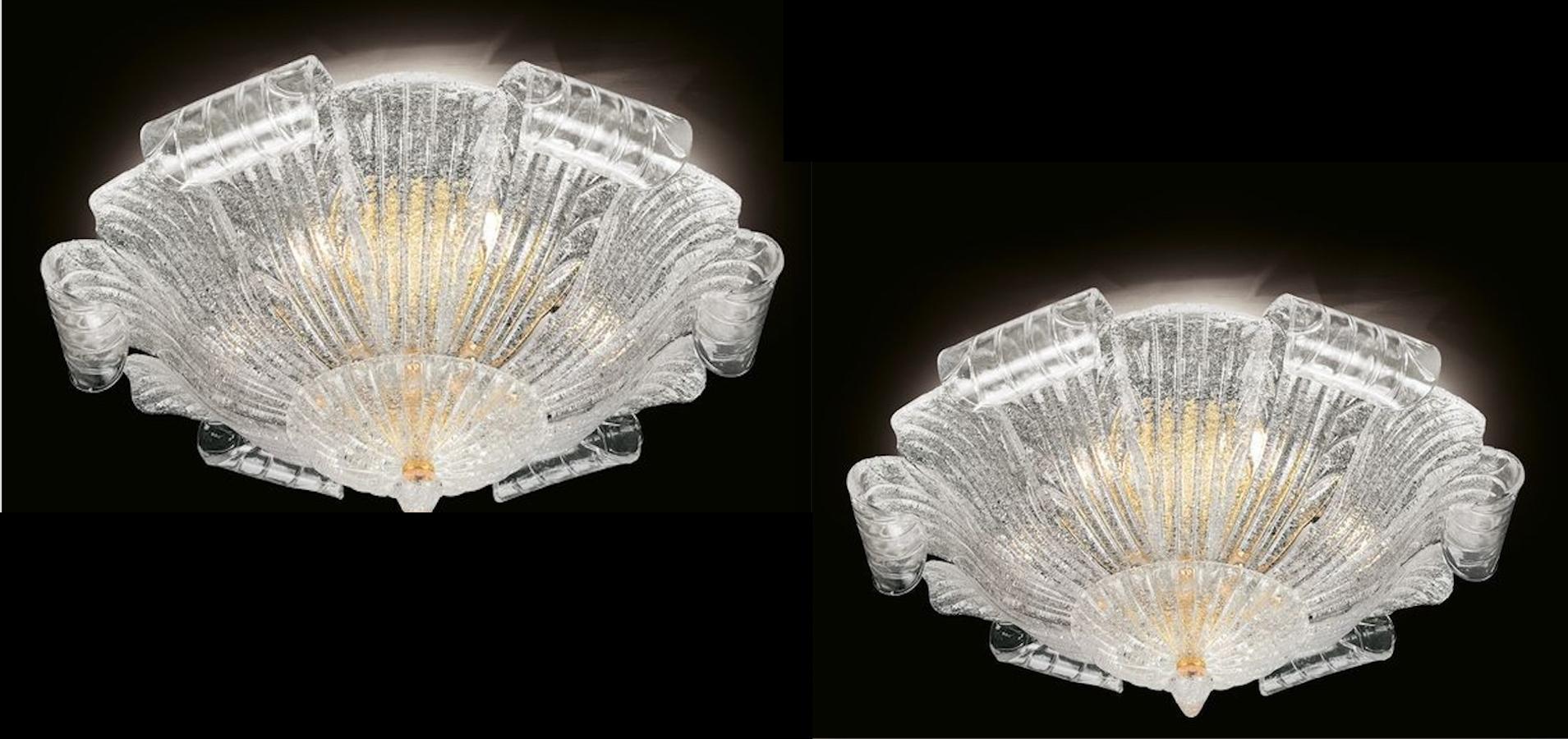 This ceiling lights realized in pure Murano glass large leaves with amazing 24-carat gold-plated structure and canopy.
This beautiful ceiling light gives an elegant Ambience a special flair and is an absolute eye-catcher even when switched off.
Five