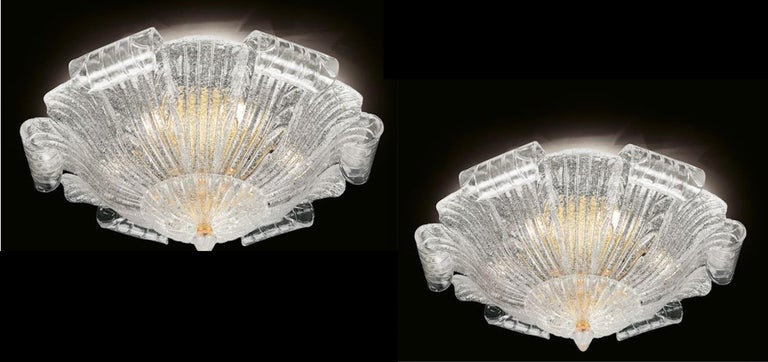 This ceiling lights realized in pure Murano glass large leaves with amazing 24-carat gold-plated structure and canopy.
This beautiful ceiling light gives an elegant Ambience a special flair and is an absolute eyecatcher even when switched