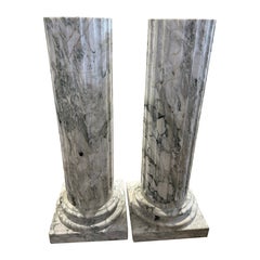 Pair of Grand Fluted Verde Alpi Marble Columns on Stepped Bases