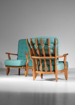 Pair of Grand repos armchairs by guillerme and chambron in oak from the 60s