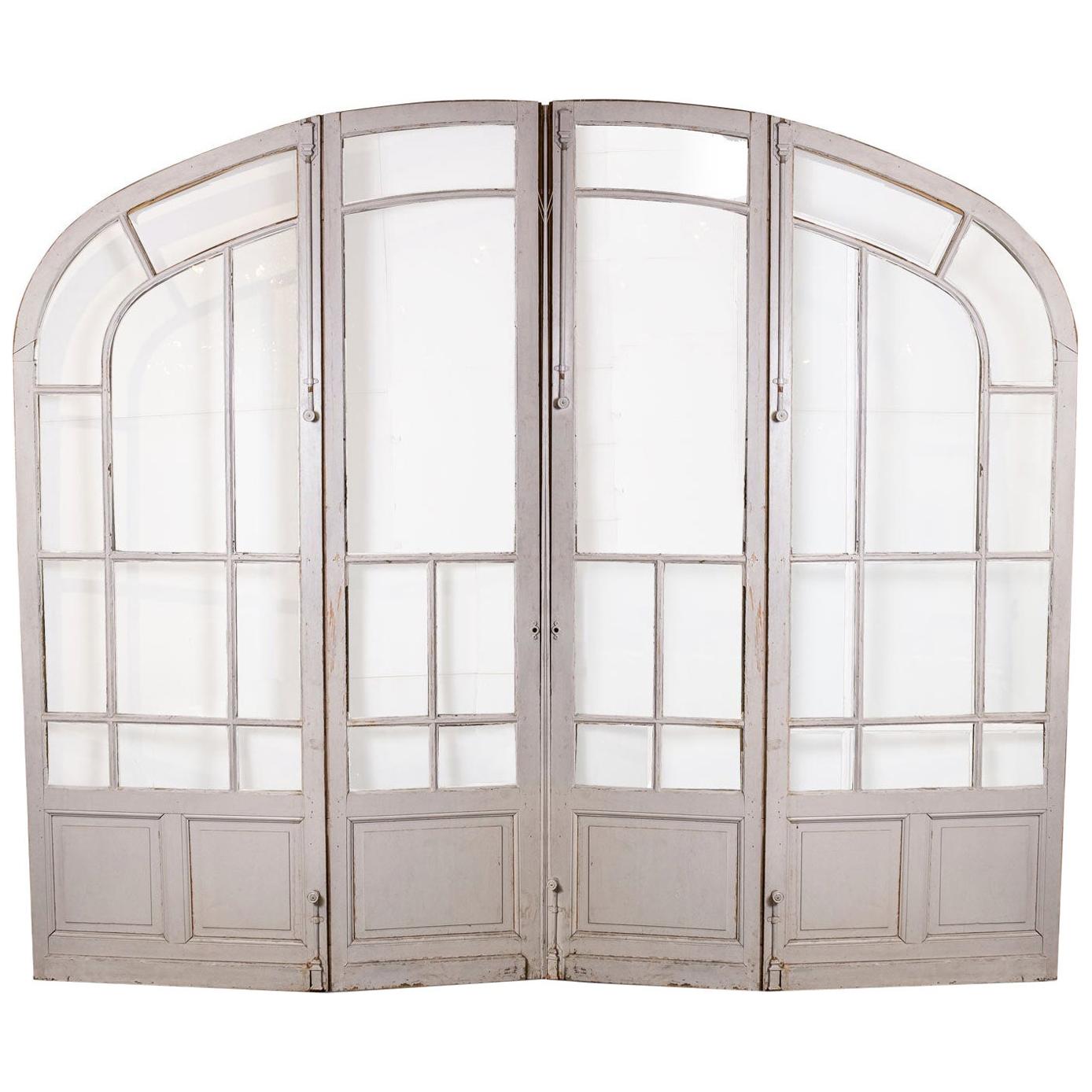 Pair of Grand-Scale Arched Glass-Paneled Double Doors For Sale