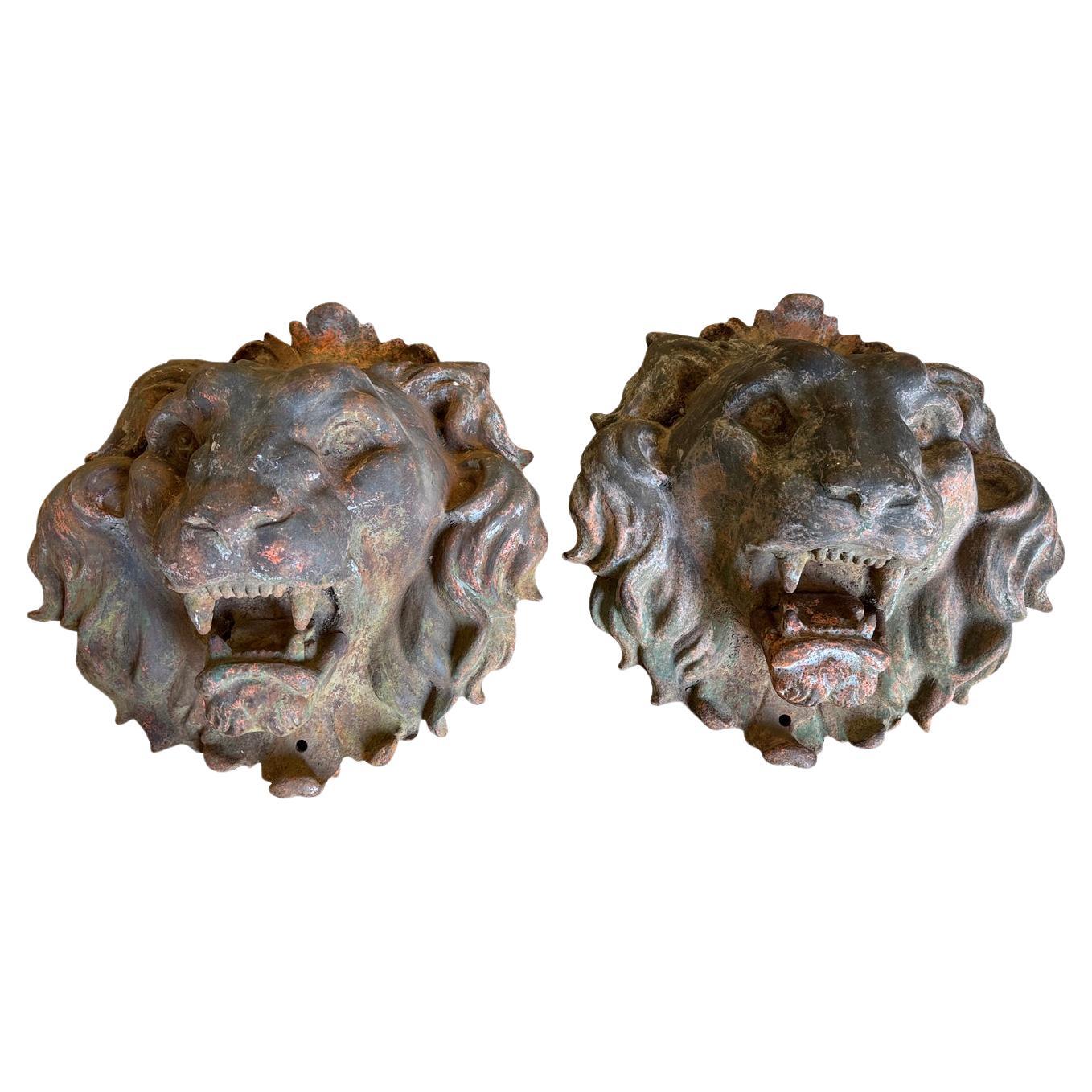 A very impressive grand scale pair of Napoleon III 19th century Lions' Heads beautifully cast in iron.  A wonderful statement for any entryway.