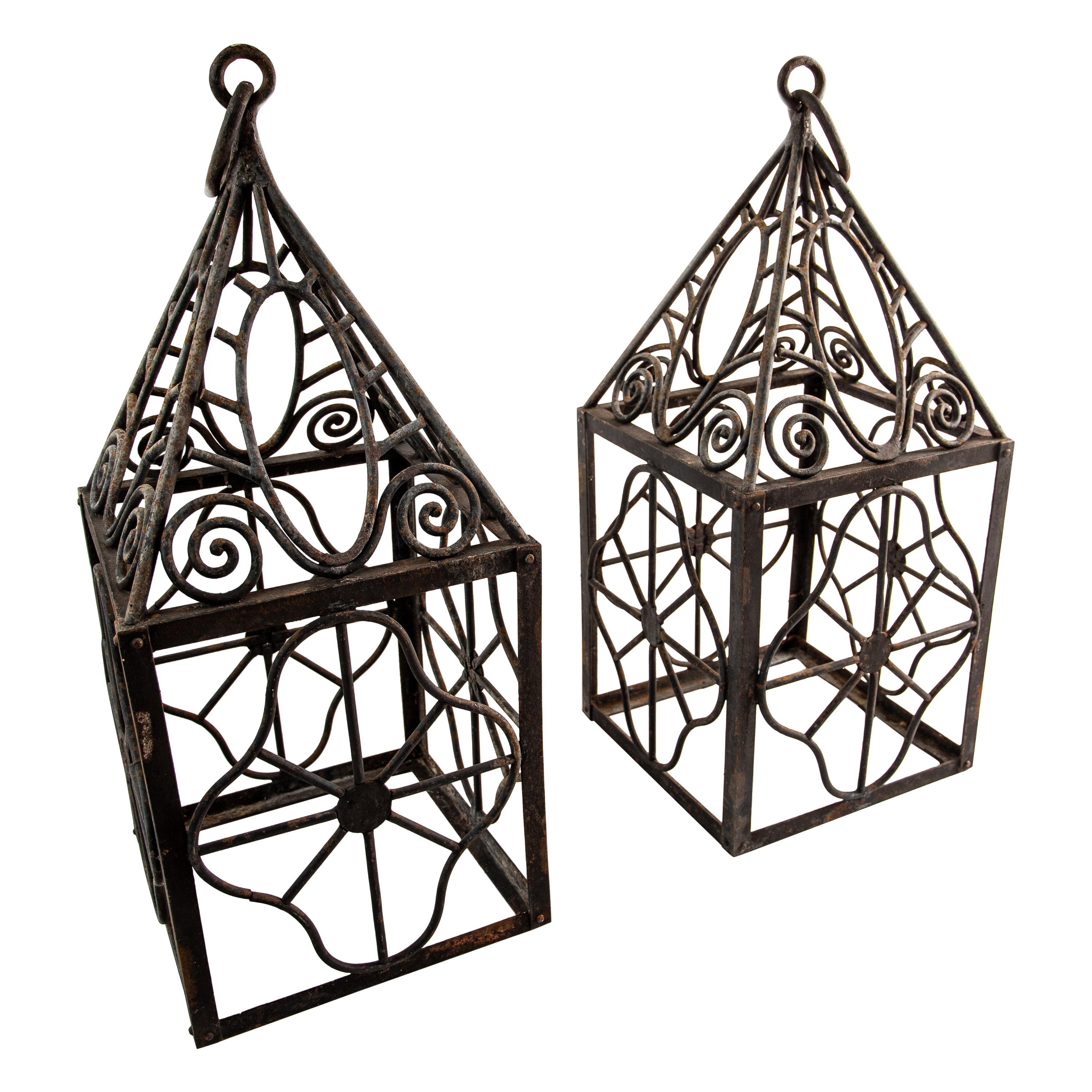 Pair of elegant French Art Deco grand scale wrought iron hurricane lanterns