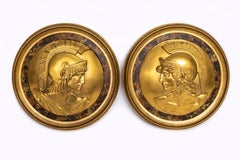 Pair of Grand Tour Gilt Bronze circular shaped plaques of Roman Gladiators