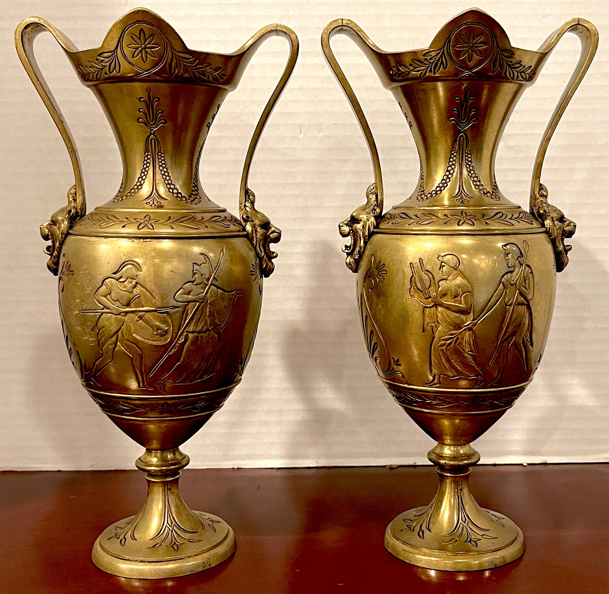 Pair of Grand Tour 'Néo-Grec' gilt bronze vases, Attributed, F. Barbedienne
Each one with typical all over decoration, with applied handles with lion masks. Unmarked.
Each vase stands 11-inches high x 6-inches wide x x 5-inches deep, raised on a