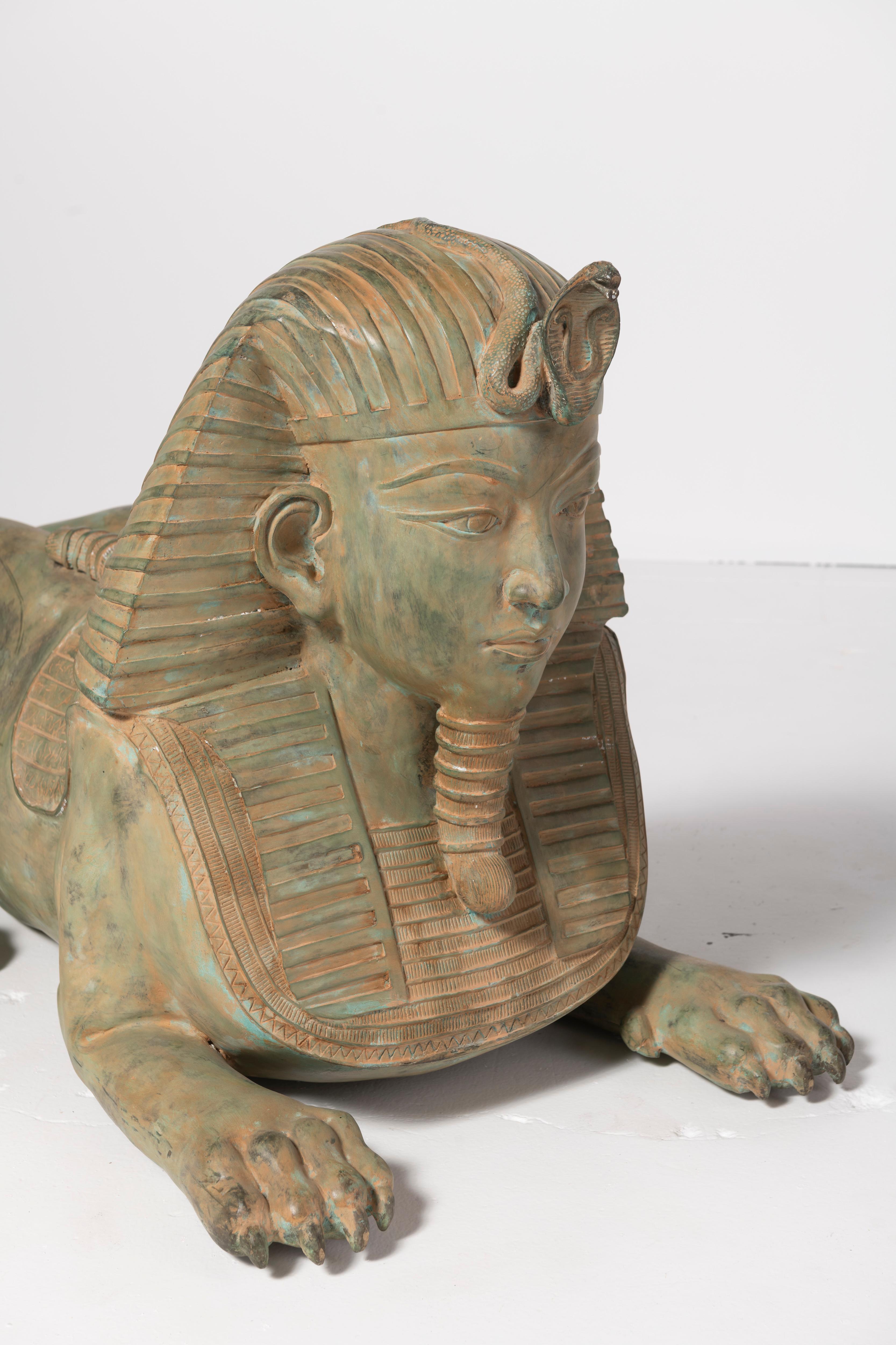 Unknown  Pair of Grand Tour Style Large Patinated Figures of Seated Sphinxes For Sale