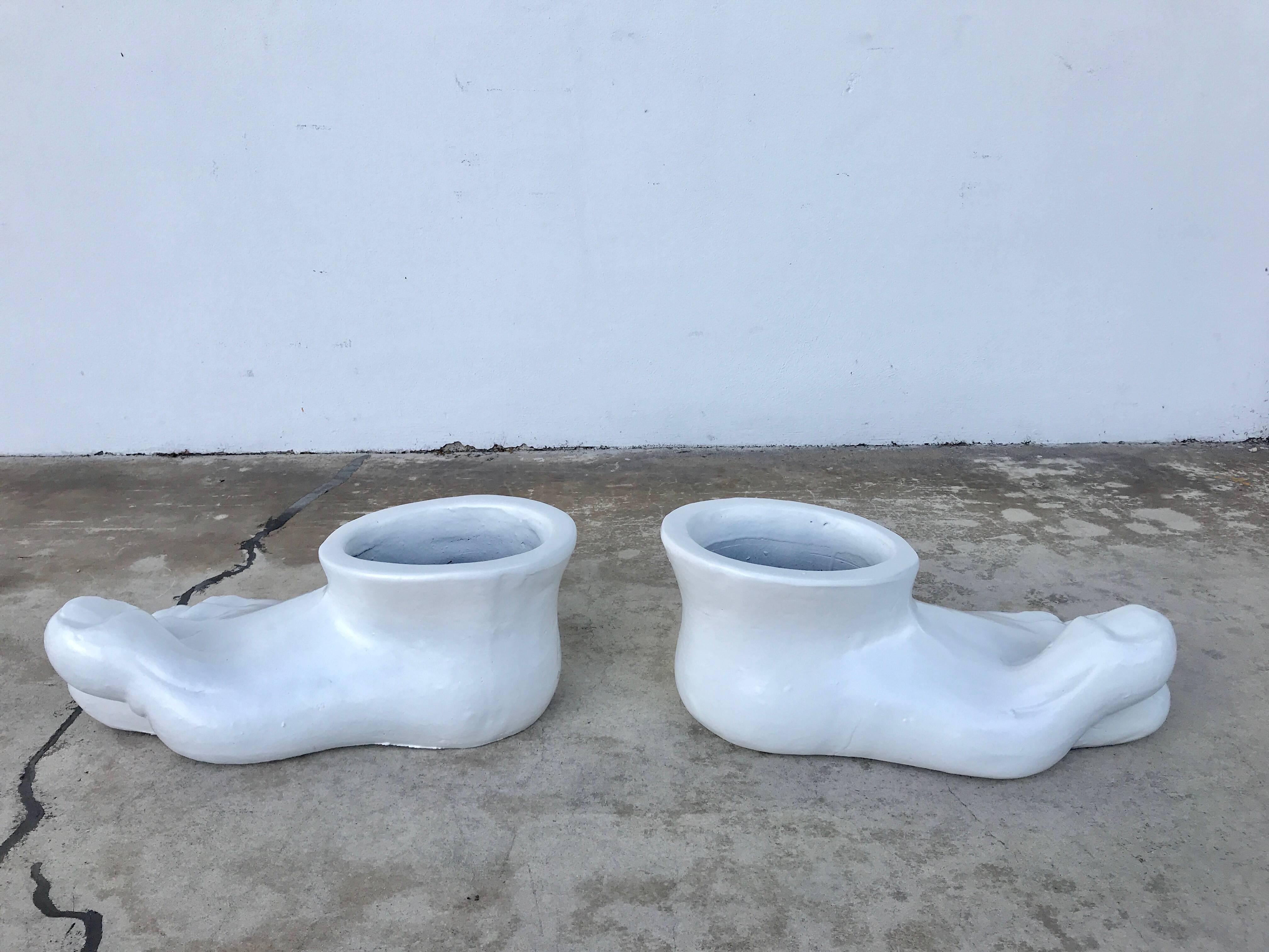 Pair of Grand Tour style roman foot planters, after the antique, second pair available
each one of substantial size of white glazed terracotta
opening is 8.5 
