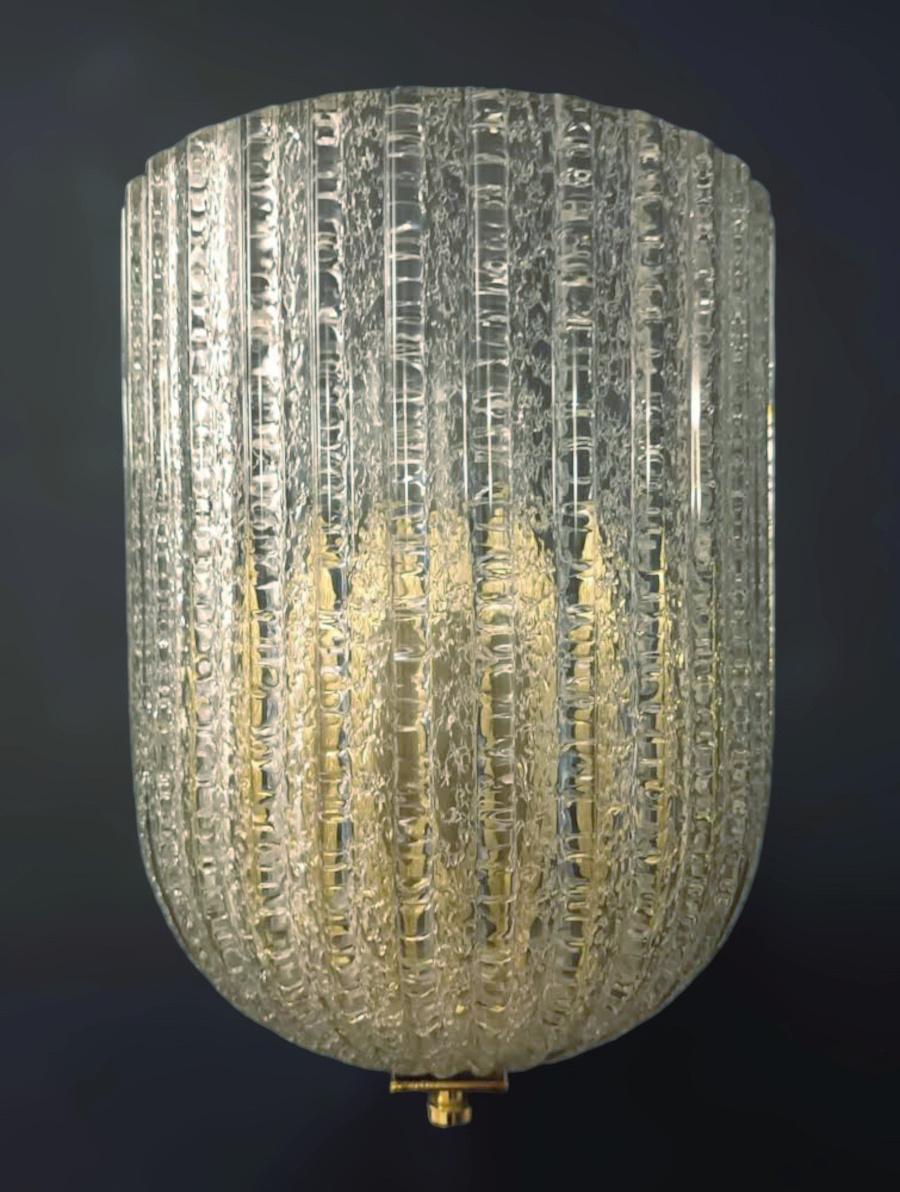Italian wall light with a Murano glass shield hand blown in Graniglia technique to produce granular textured effect / Made in Italy by Barovier e Toso, 1960s
Original label on frame
Measures: Height 9.5 inches, width 7 inches, depth 4.5 inches
1