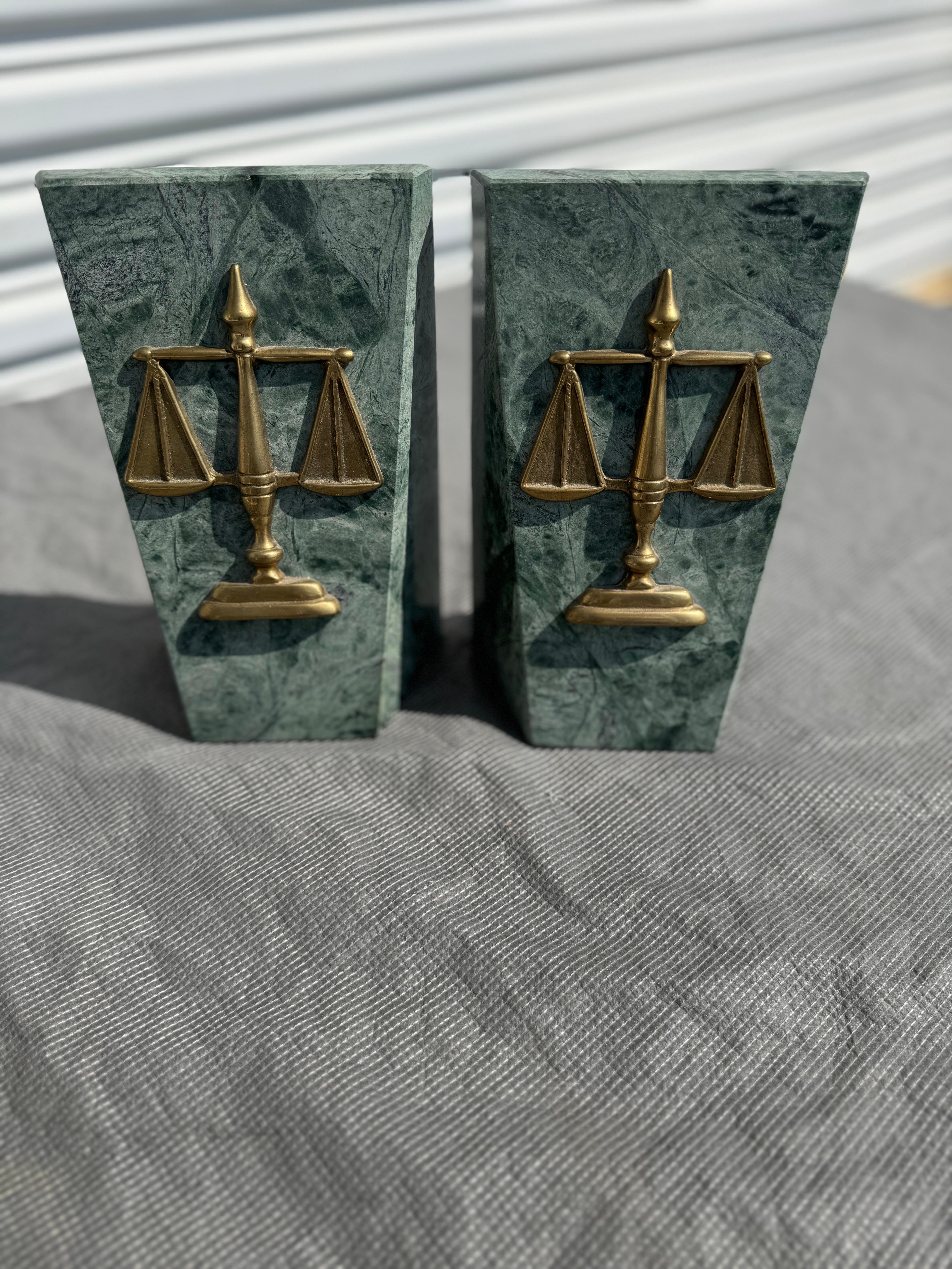 These bookends depict the scales of justice.
They would be great for a Lawyer's office.
The scales are made of brass and are outset from the marble.