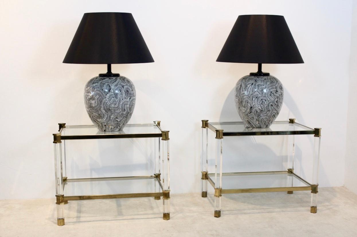 Beautiful pair of midentury table lamps from the 1970s made by H. Pander & Zonen, The Hague, Holland. The set is unique and has a fantastic graphical print. The lamp’s still have the original paint; the ceramic is in mint condition. The set comes