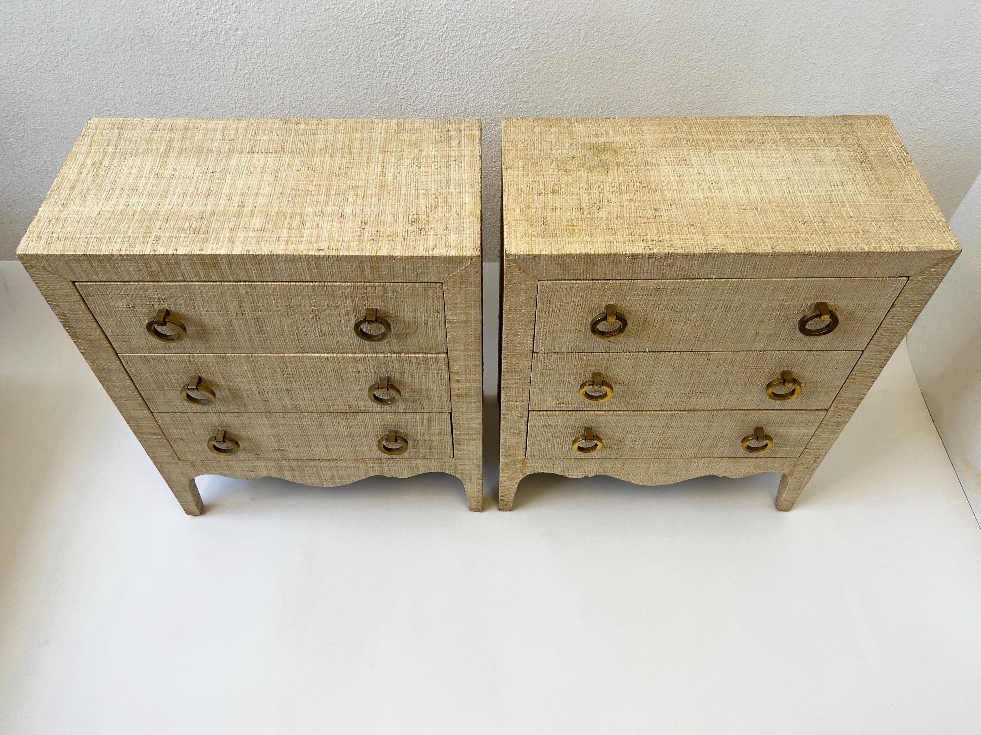 Hollywood Regency Pair of Grasscloth and Brass Night Stands For Sale