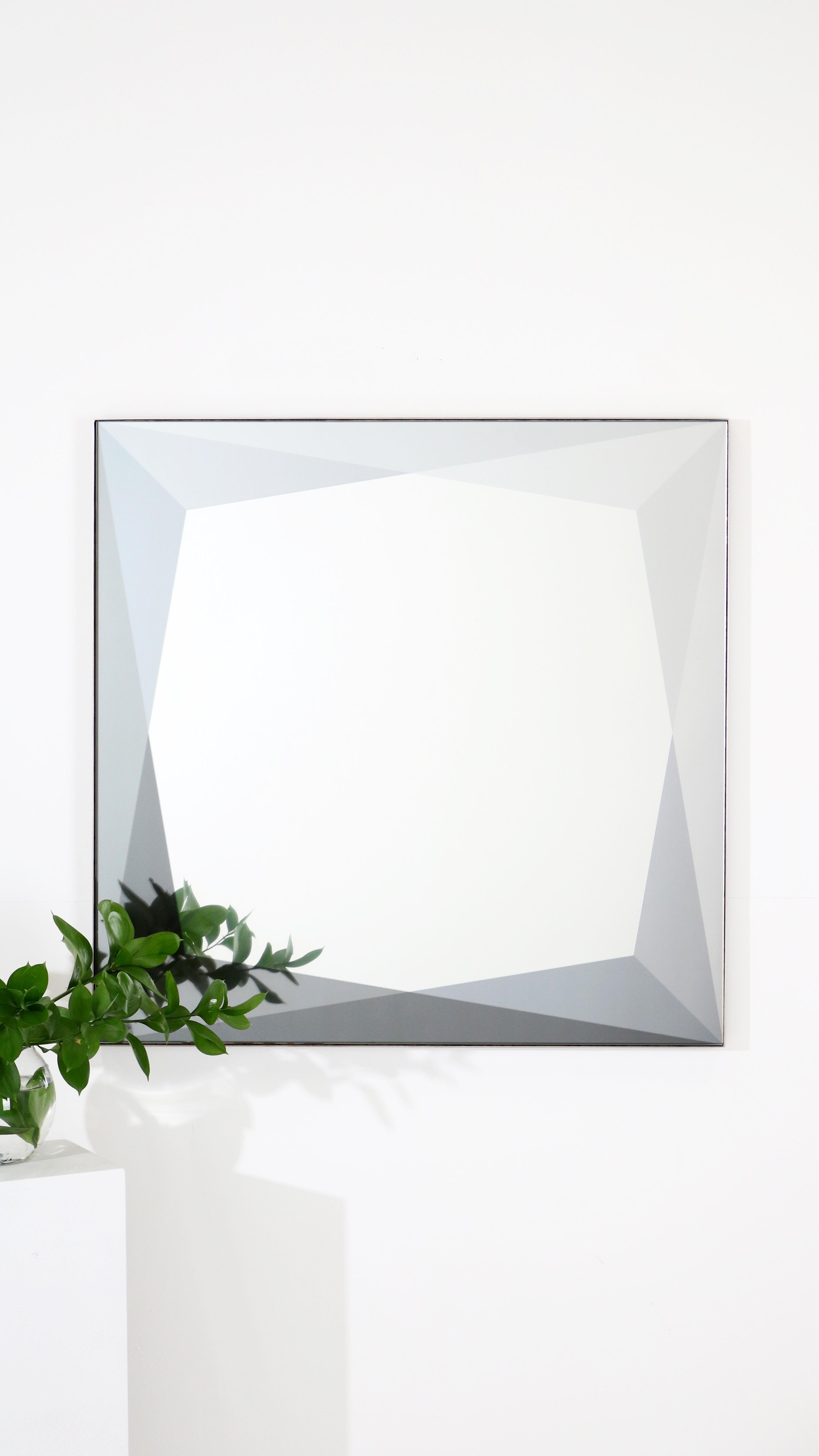 Our new mirror collection explores the facets found in gemstones through layers of color and varying transparency. These square gem mirrors composed of low iron clear/ low iron mirrored glass with a permanently laminated interlayer, polished and