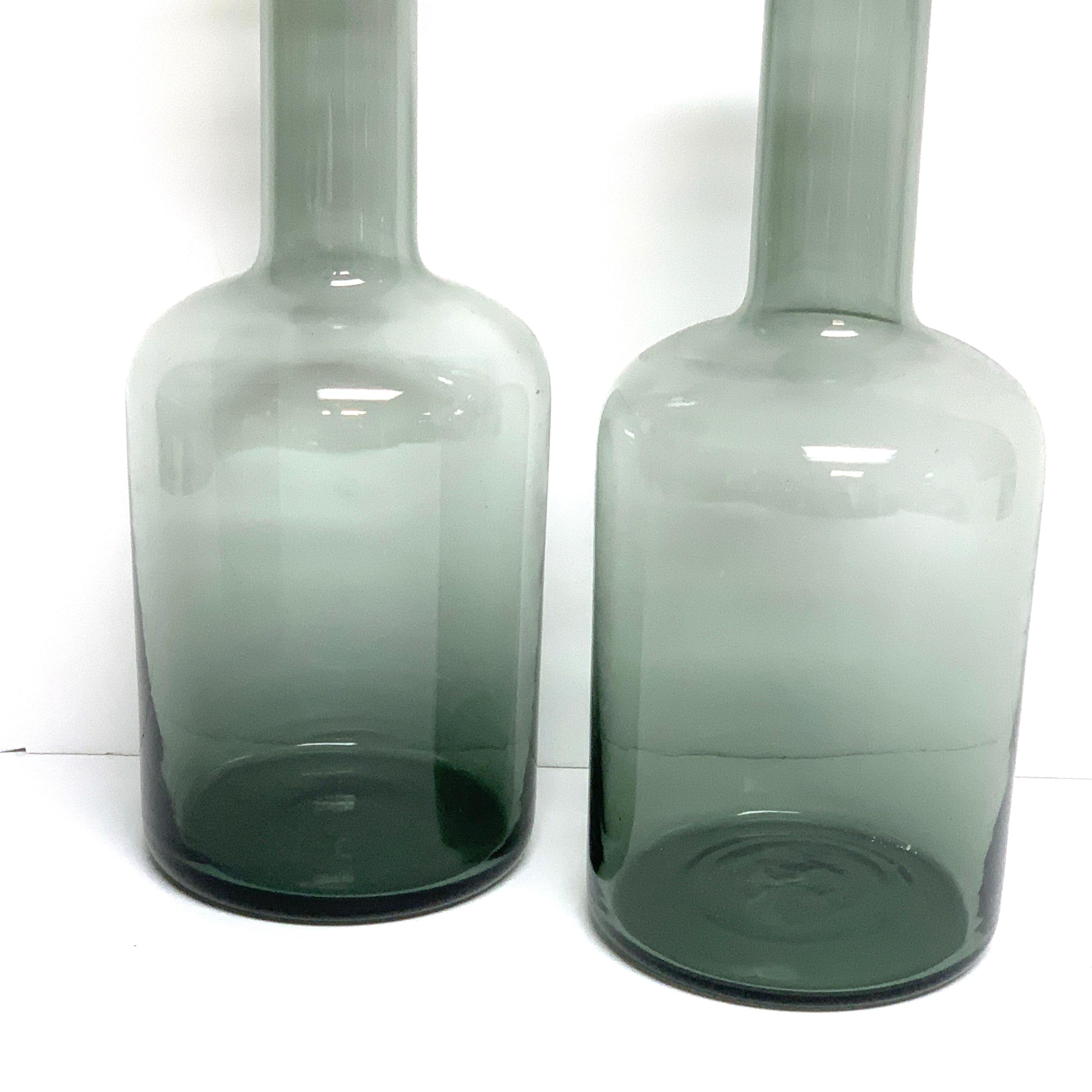 Pair of Gray Holmegaard glass bottle vases, by Otto Brauer
Each one the same size 12
