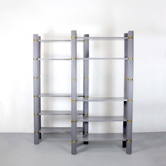 Pair of gray lacquered wooden shelves with fluted uprights and gilt brass detail