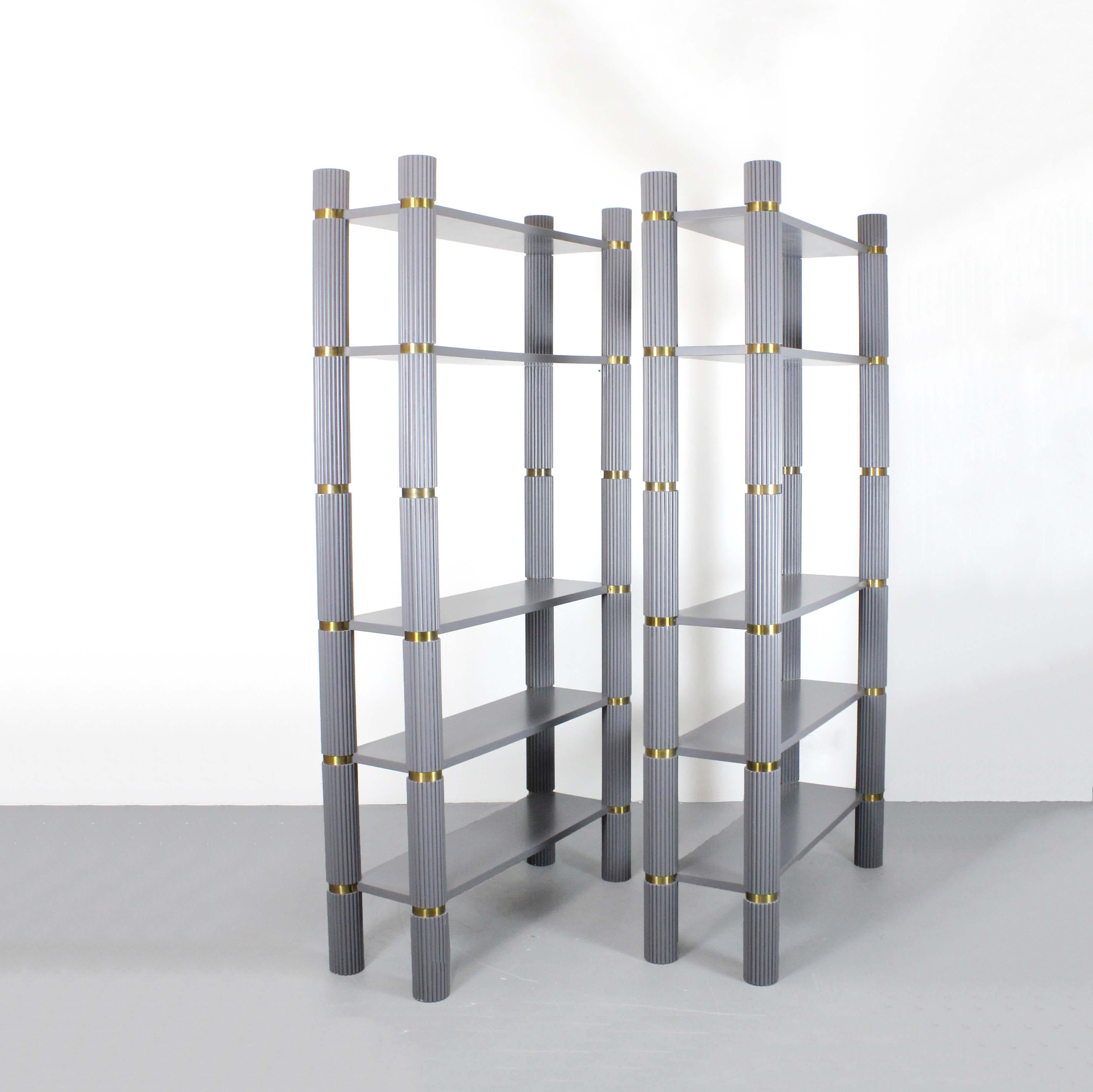 Spanish Pair of gray lacquered wooden shelves with fluted uprights and gilt brass detail For Sale
