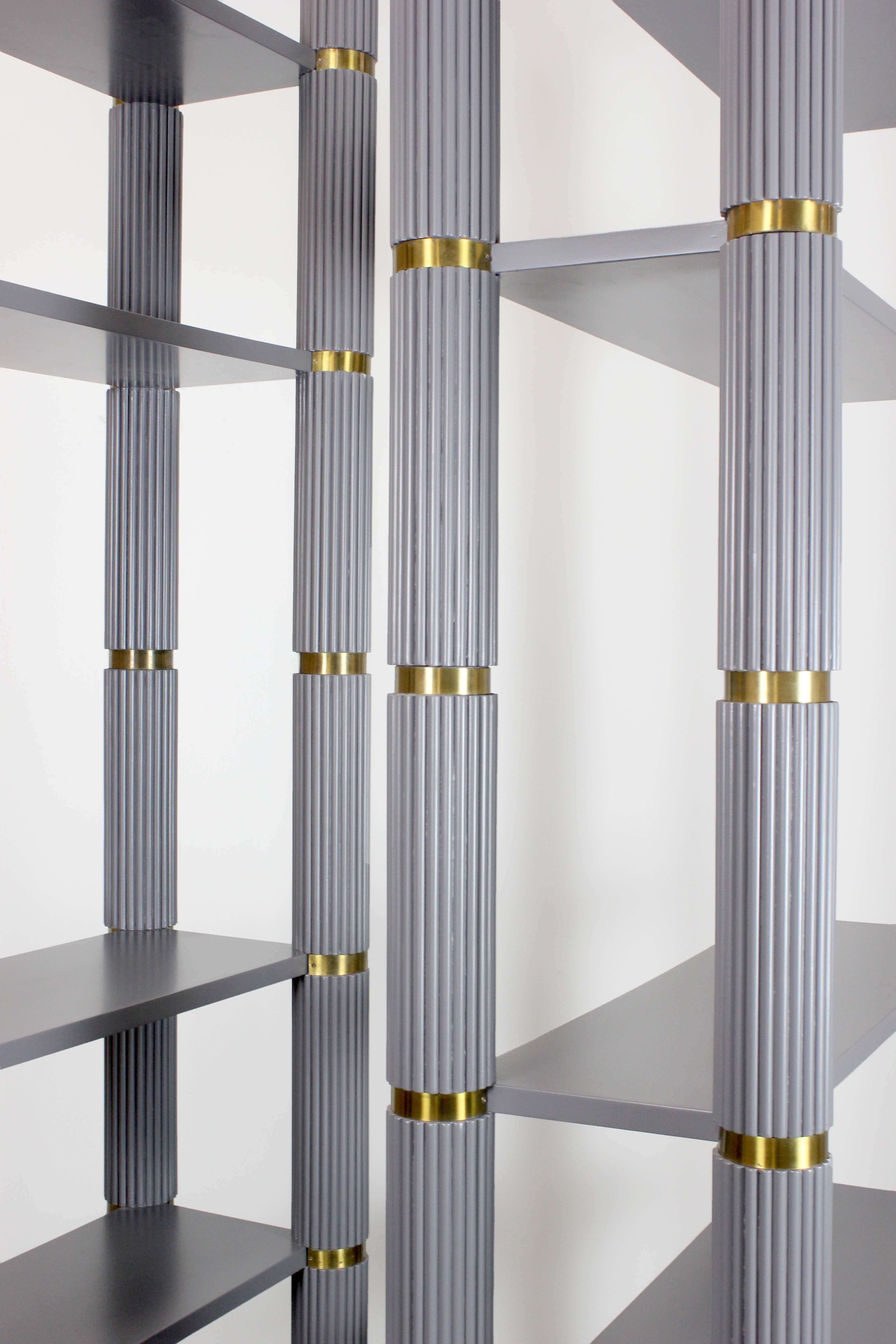 Lacquered Pair of gray lacquered wooden shelves with fluted uprights and gilt brass detail For Sale