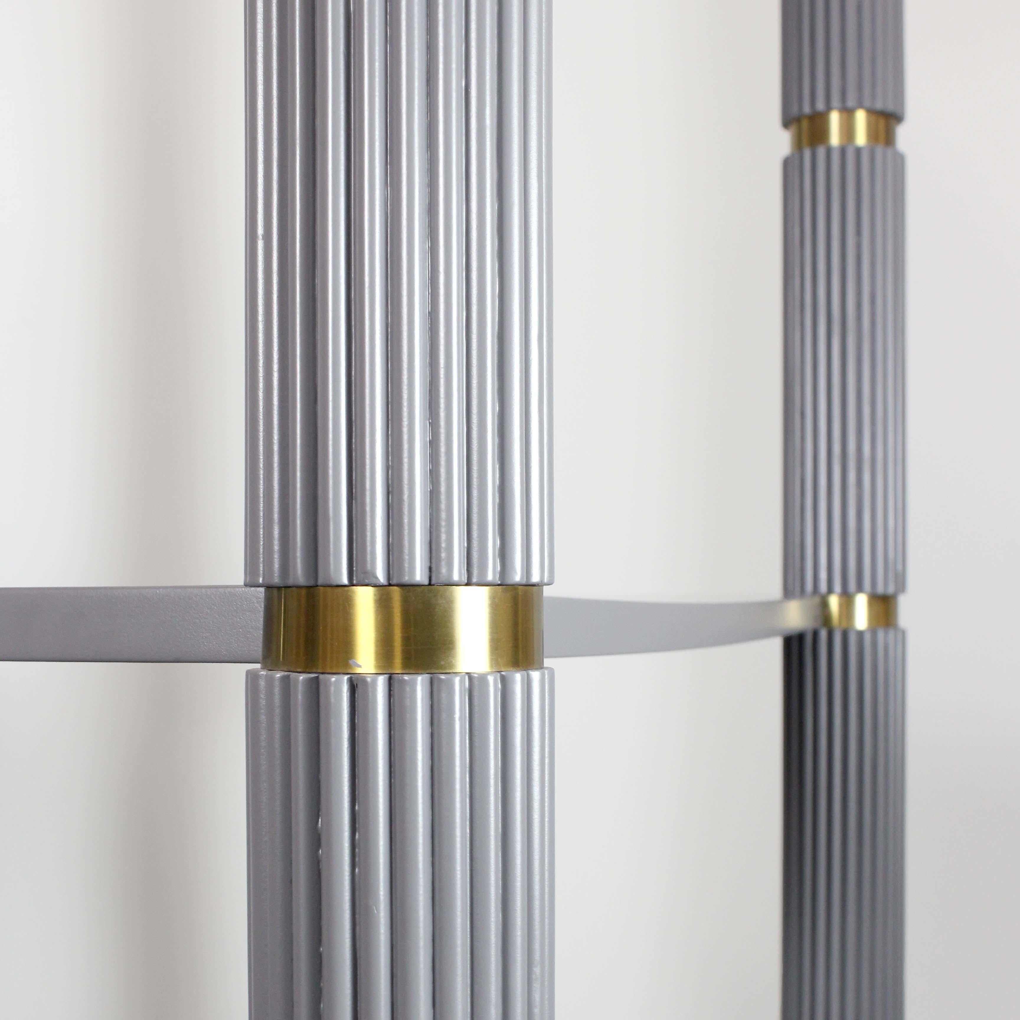 Late 20th Century Pair of gray lacquered wooden shelves with fluted uprights and gilt brass detail For Sale