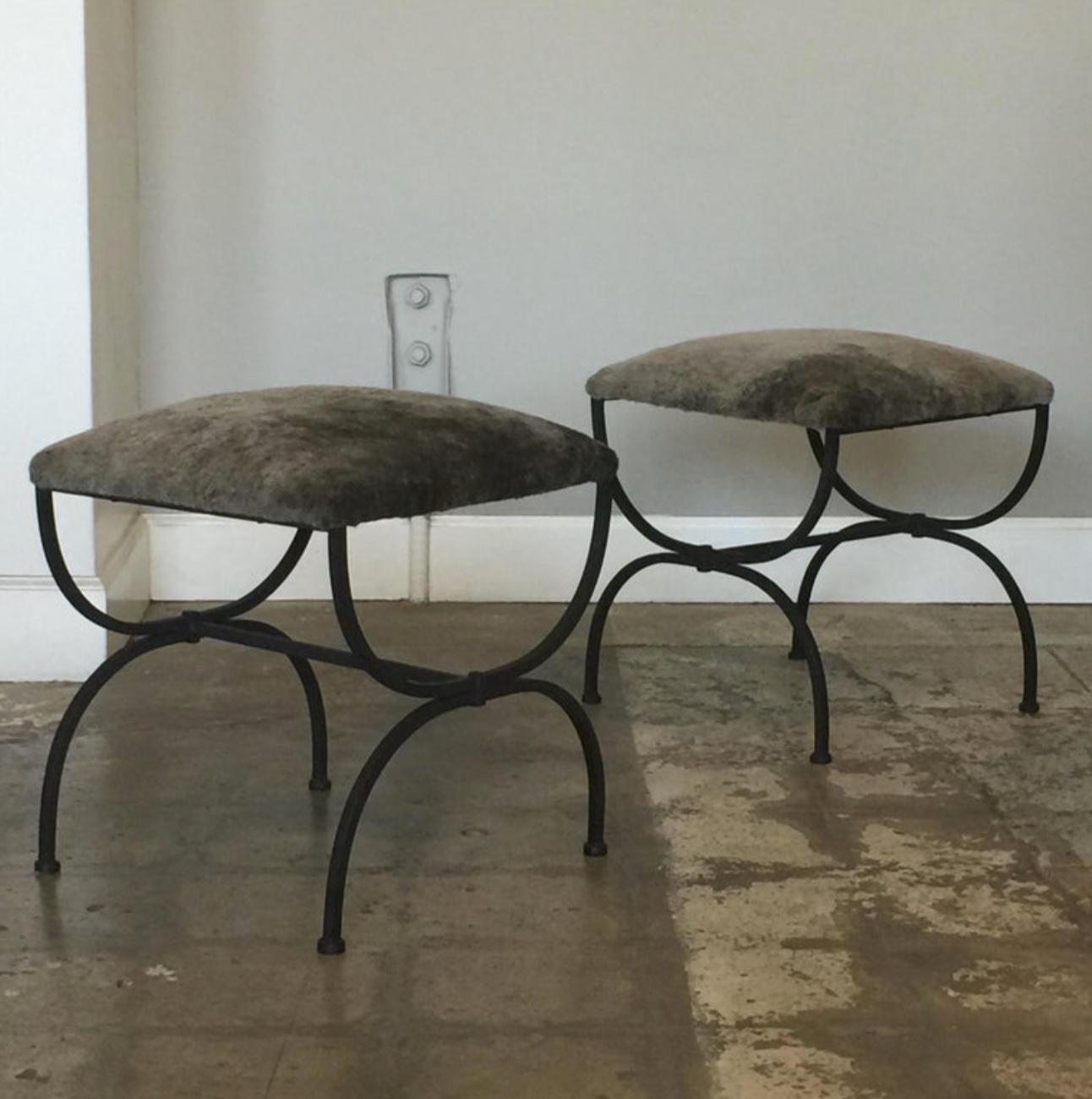 Pair of chic gray shearling 'Strapontin' stools by Design Frères. Matte black steel base with grey shearling upholstered seats.