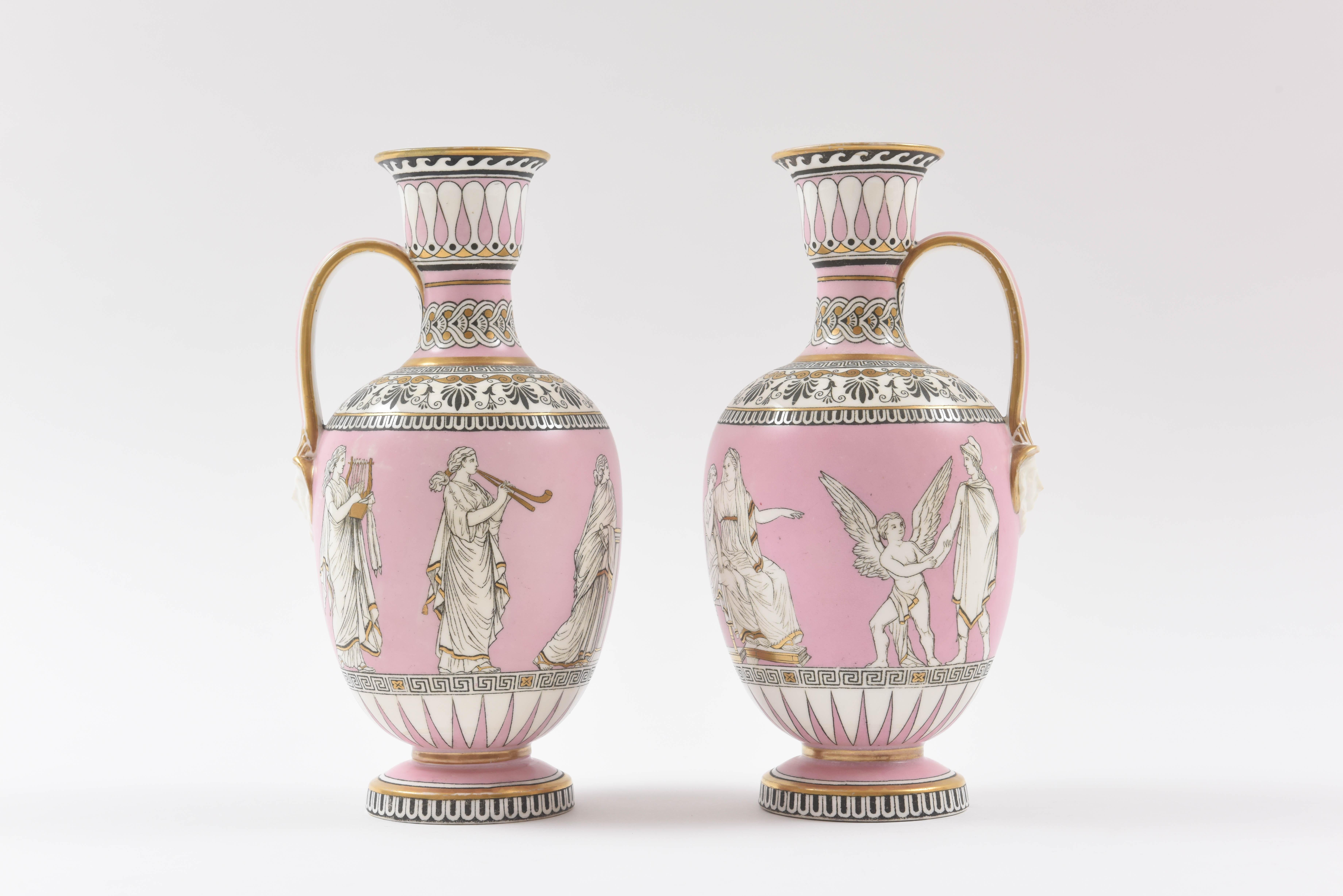 From the storied English porcelain firm of Samuel Alcock & Company we have an interesting and rare pair of vessels depicting a classic Greek tale. White, gold and black design accents on a soft pink ground. These vases also feature a female figural