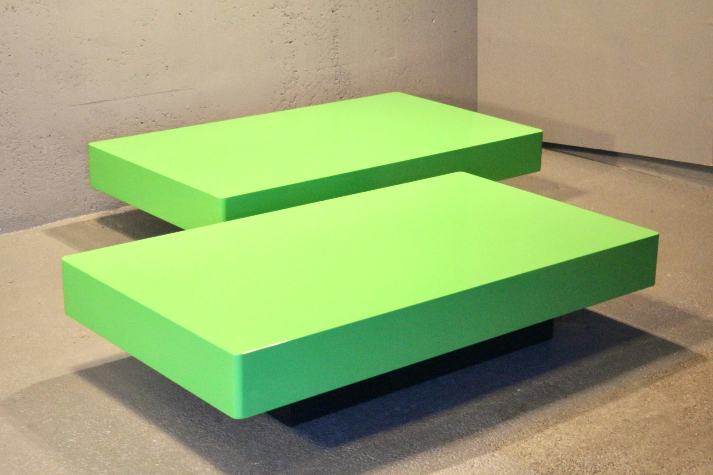 Pair of green and black lacquered coffee table , the base is black 