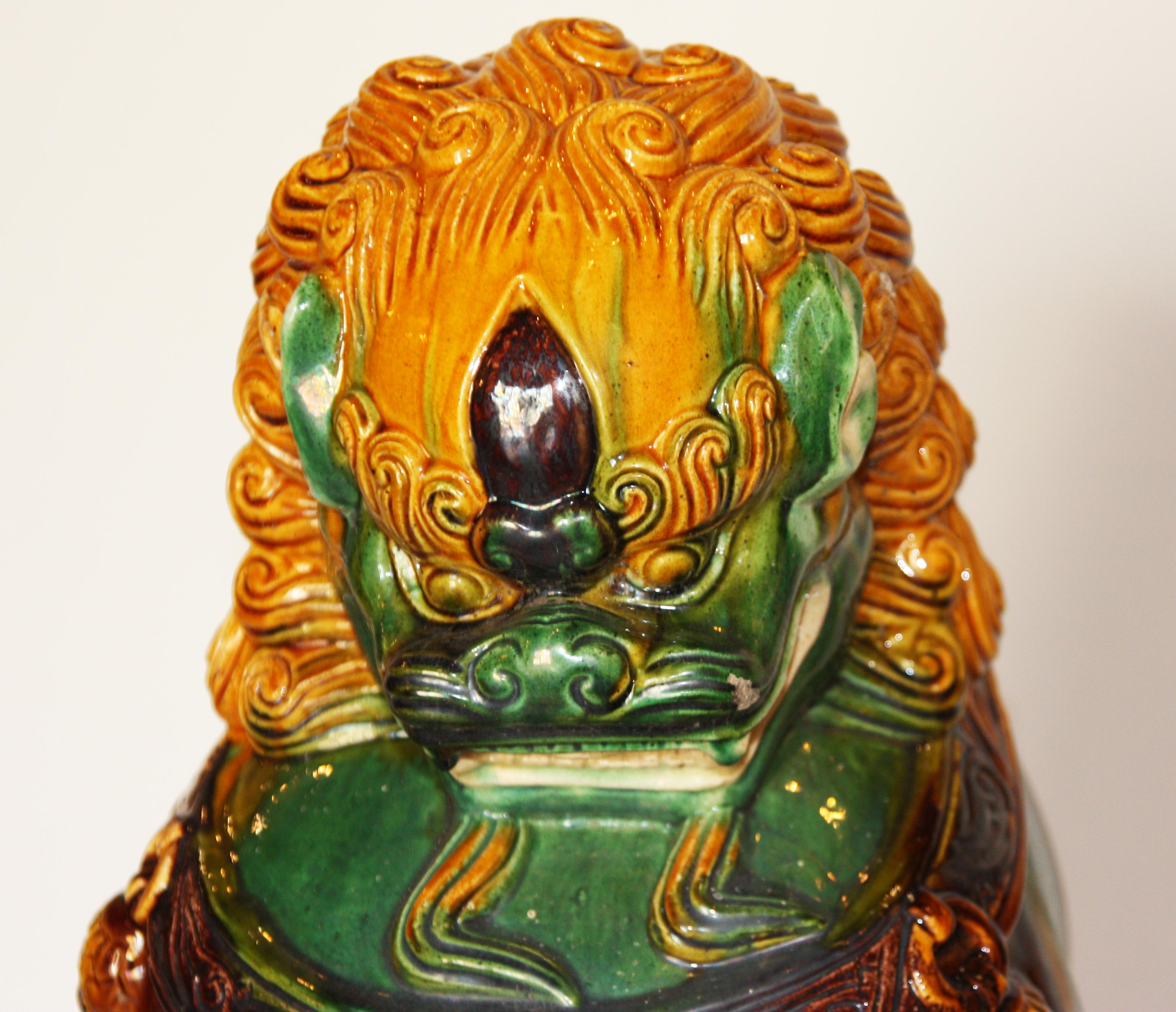 Asian Pair of Green and Gold Chinese Sancai Glazed Foo Dogs